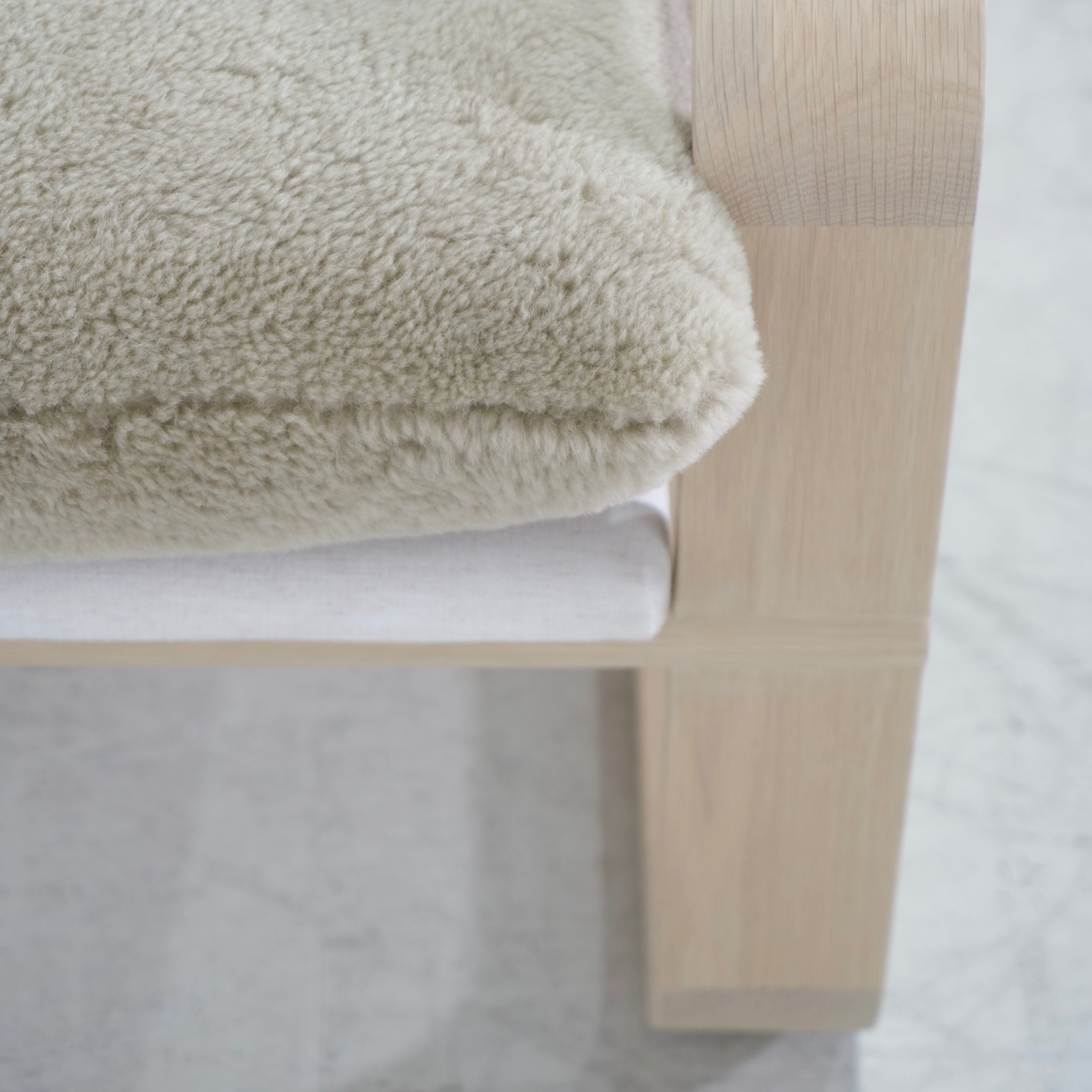 As Shown: in Dusty Beige Shearling, Nora snow frame and Mint White Natural oak.