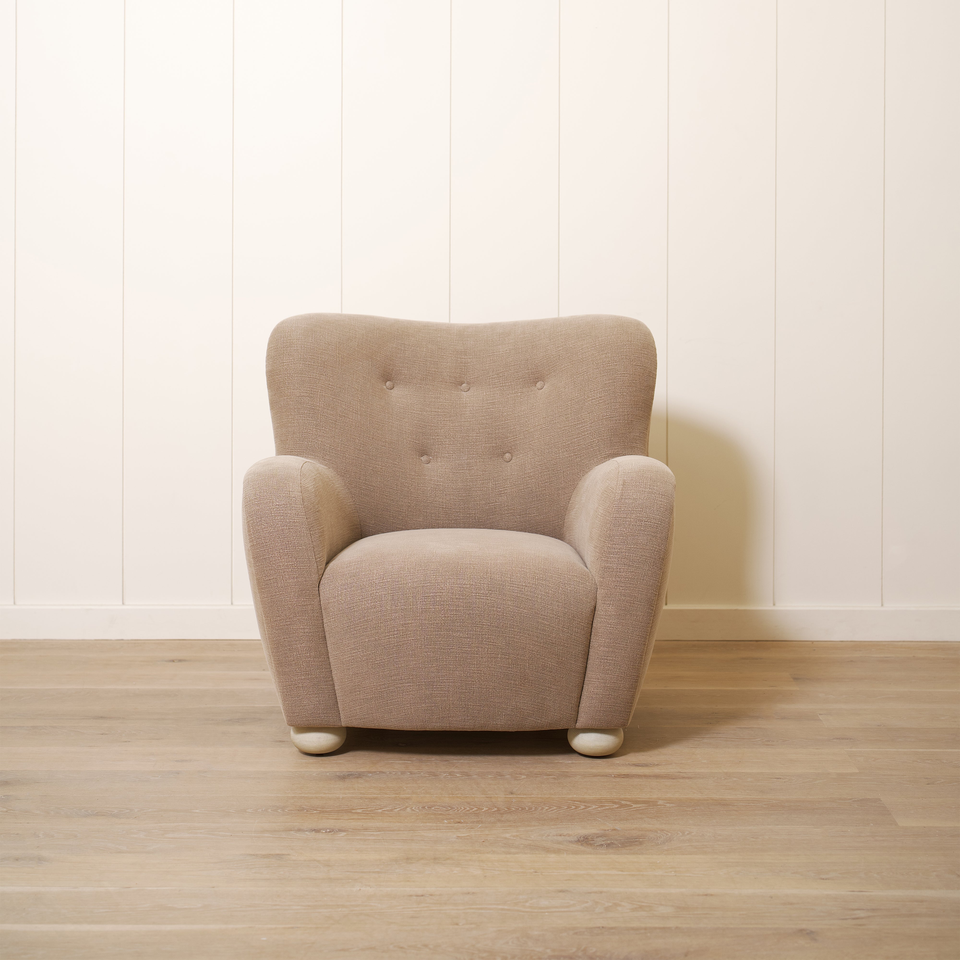 As shown upholstered in Vail Bark, legs in Sand finish