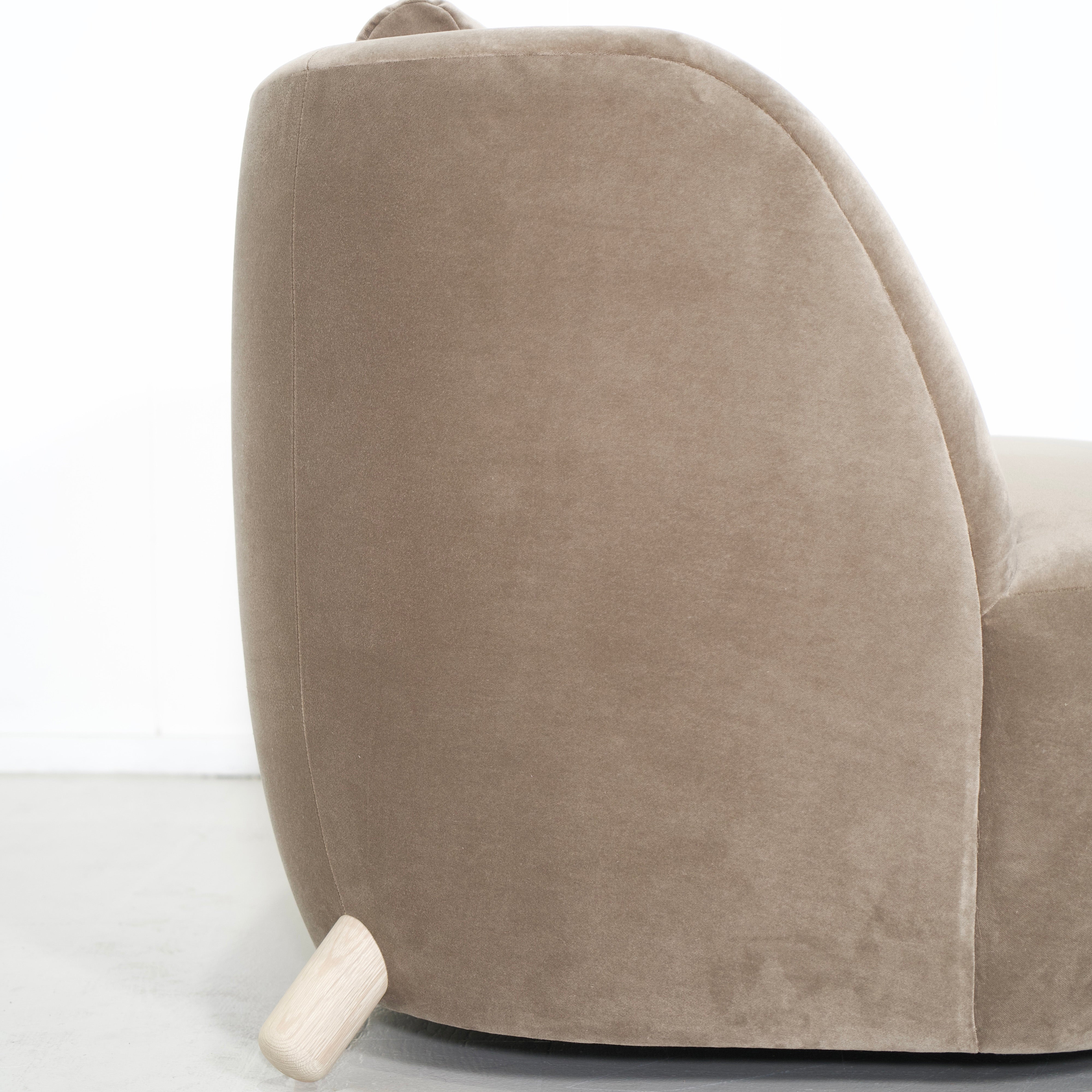 As Shown: in Sky Taupe with oak legs stained in Mint White Natural.