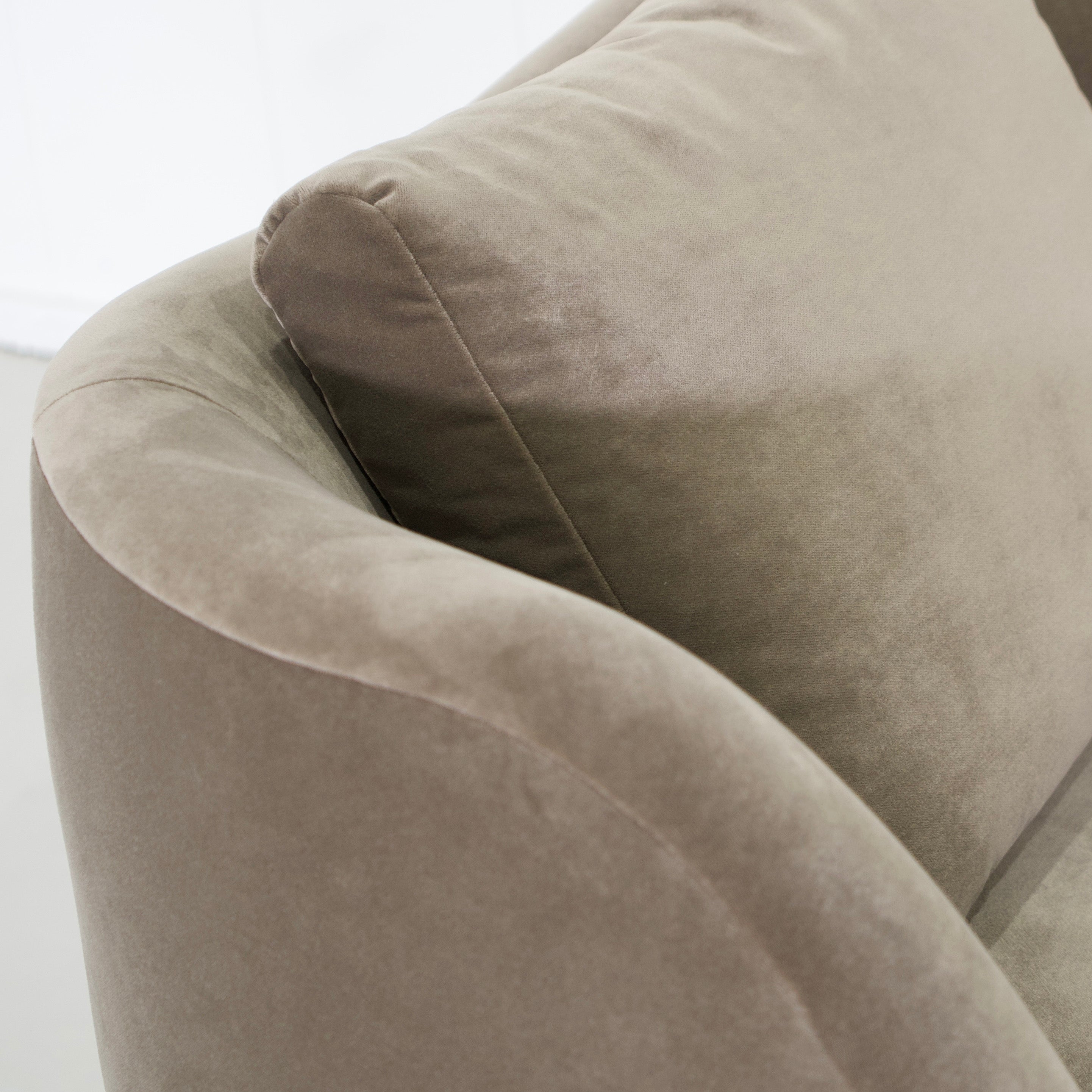 As Shown: in Sky Taupe with oak legs stained in Sand.