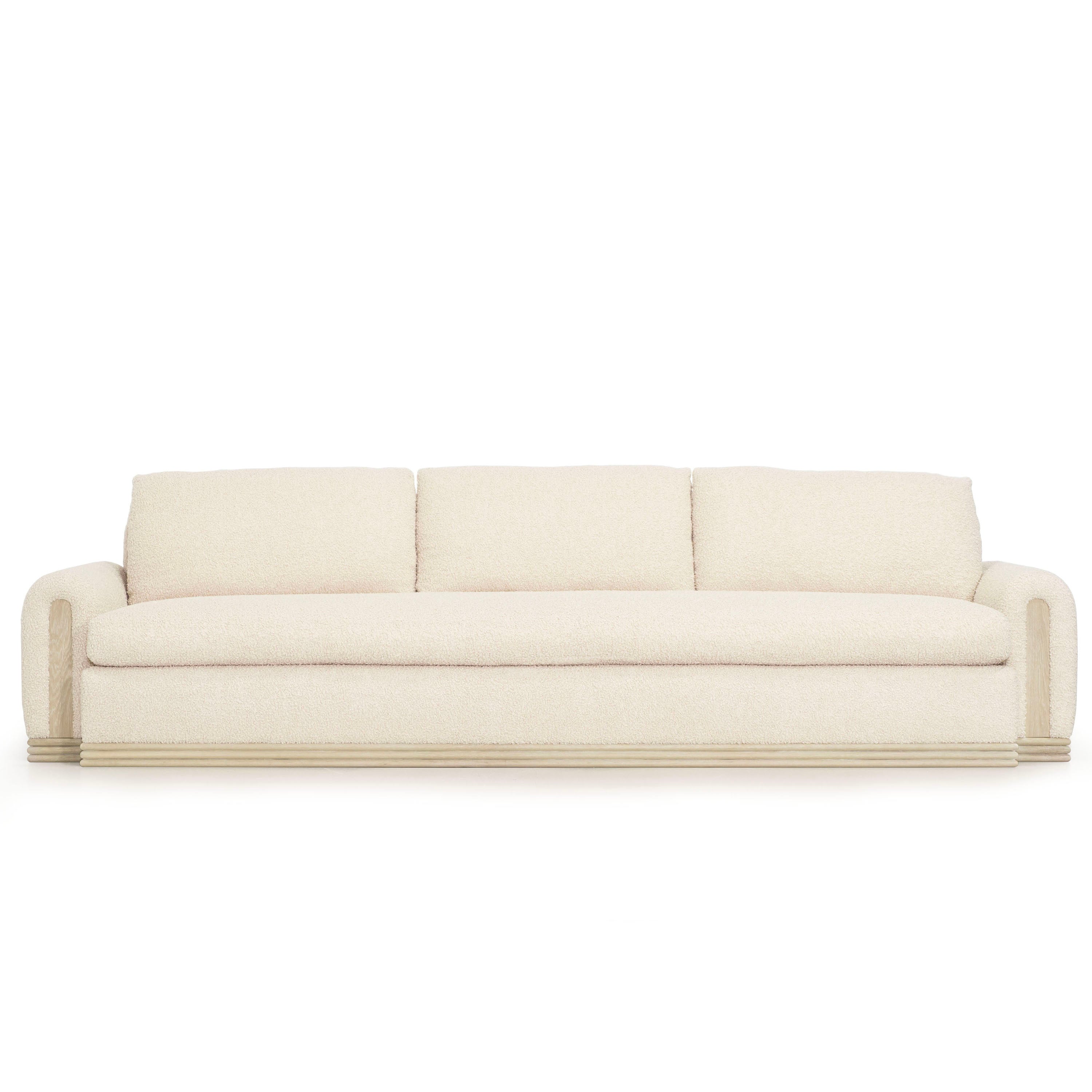 As Shown: 135"W x 42"D x 33"H | Style: Upholstered | Fabric: Teddy Ivory | Finish: Natural