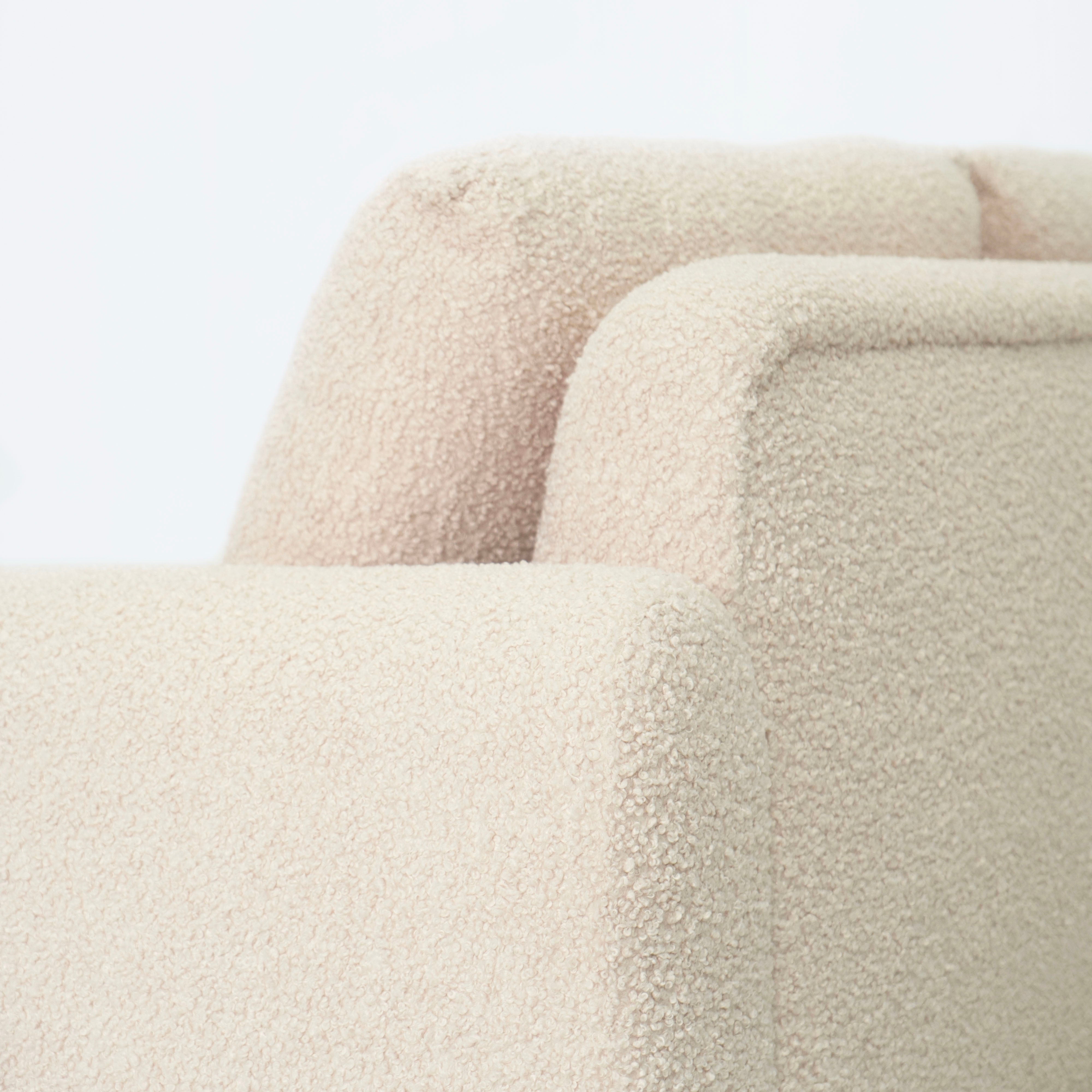 As Shown: 135"W x 42"D x 33"H | Style: Upholstered | Fabric: Teddy Ivory | Finish: Natural