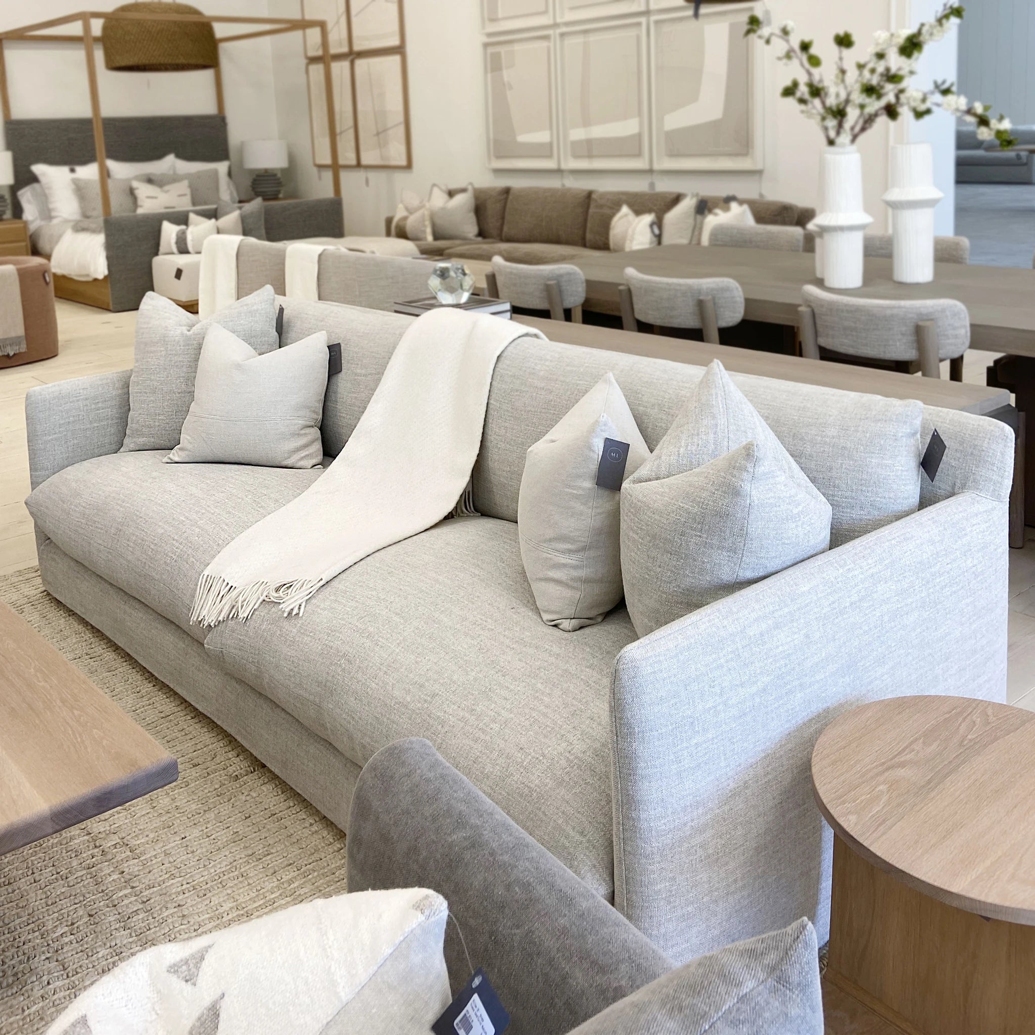 As Shown: Slipcovered in Monte Natural with legs finishing in Mint White Natural