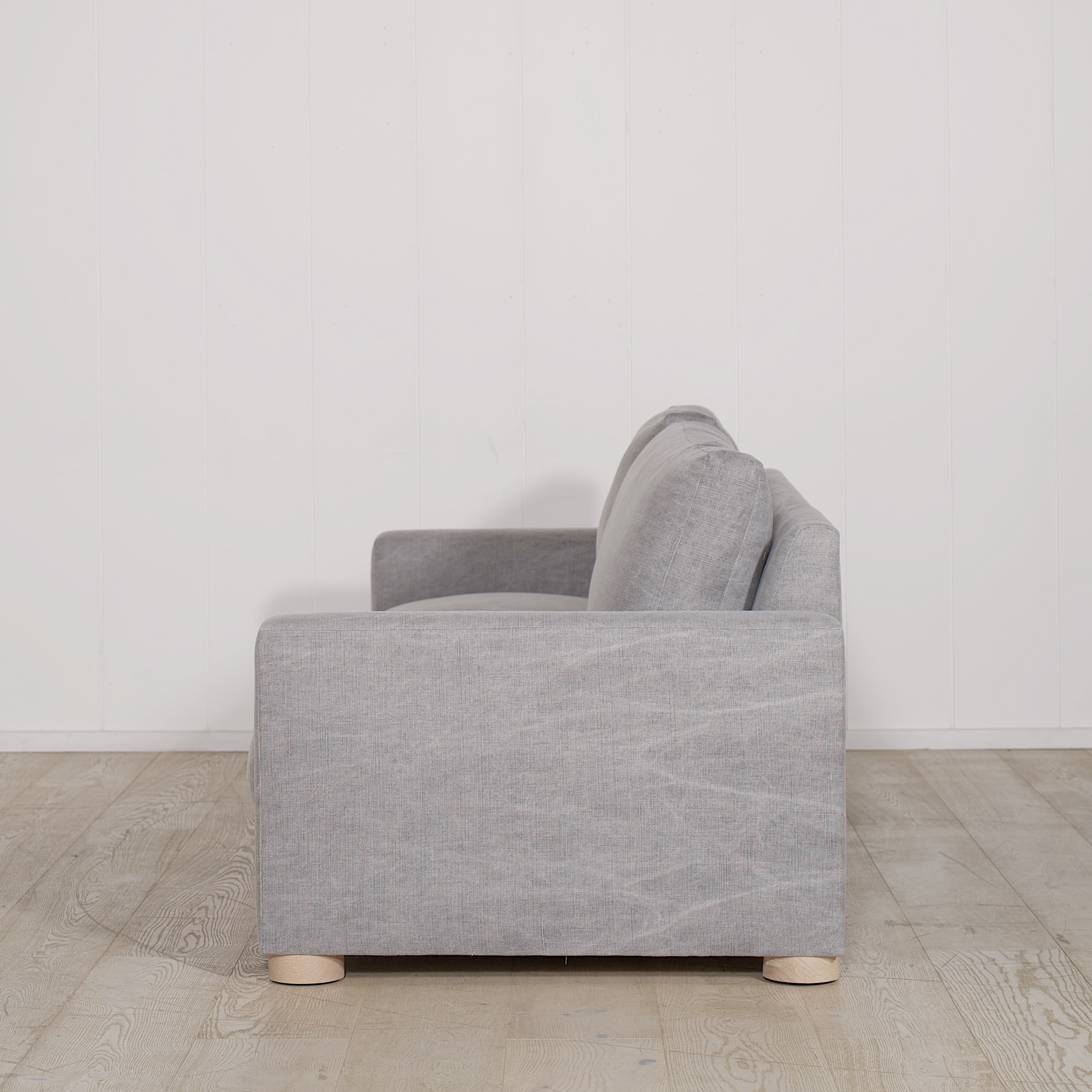 As Shown: in COM fabric, oak legs finished in Mint White Natural.