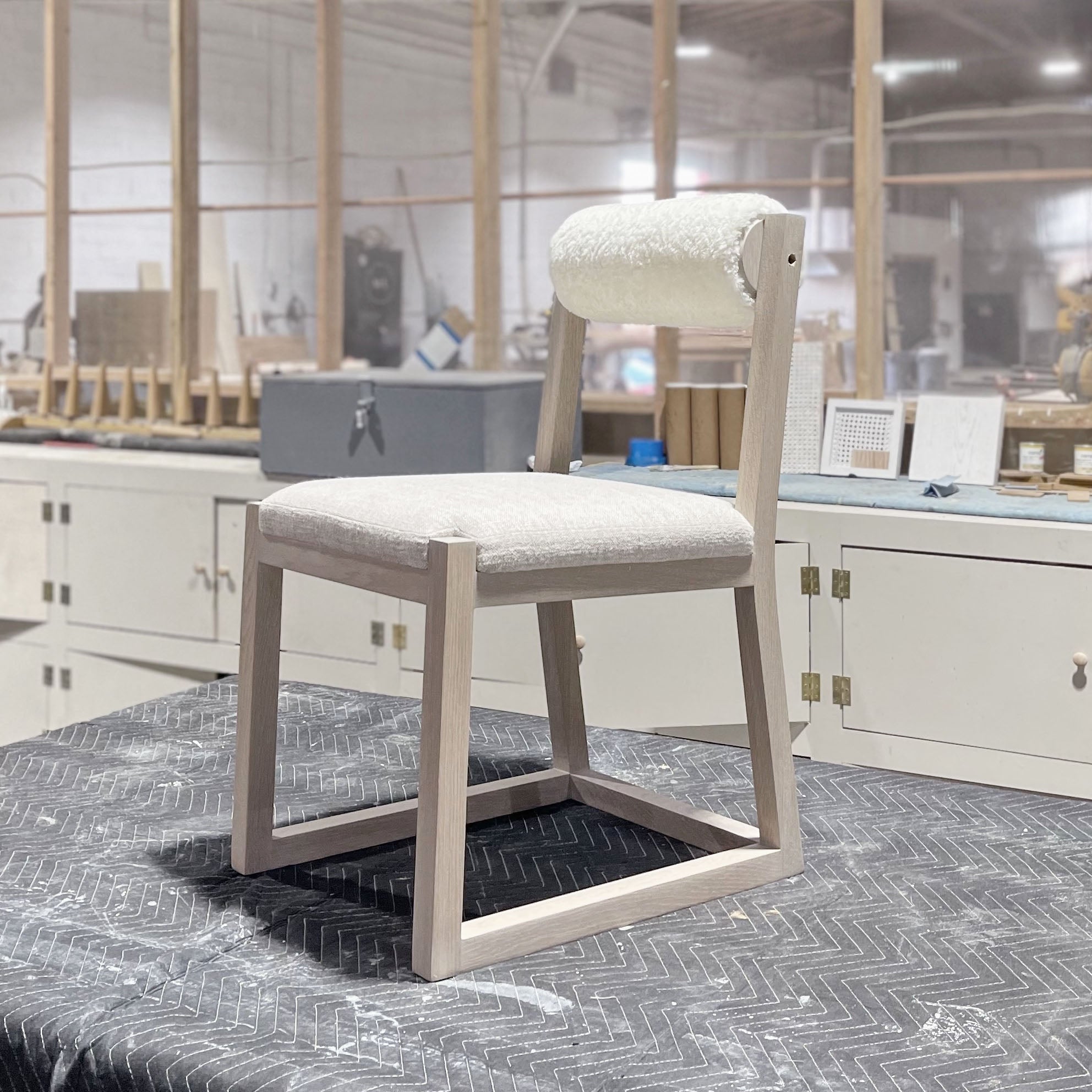 As Shown: in Lincoln Slate seat and Dusty Beige Shearling back. Oak finished in Mint White Super White.