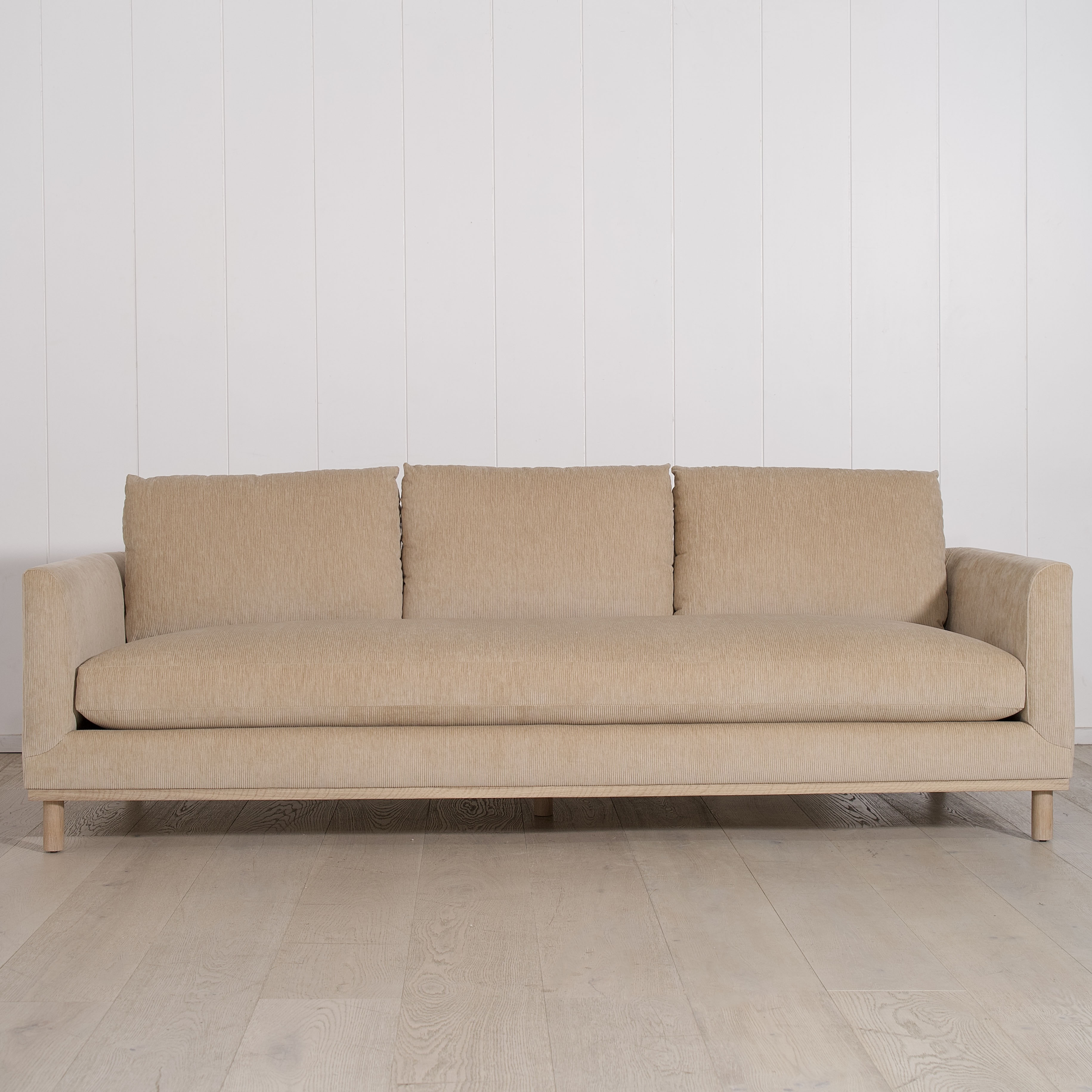 As Shown: 110"W x 38"D x 34"H | Style: Upholstered | Fabric: Mila Cashew | Finish: Natural