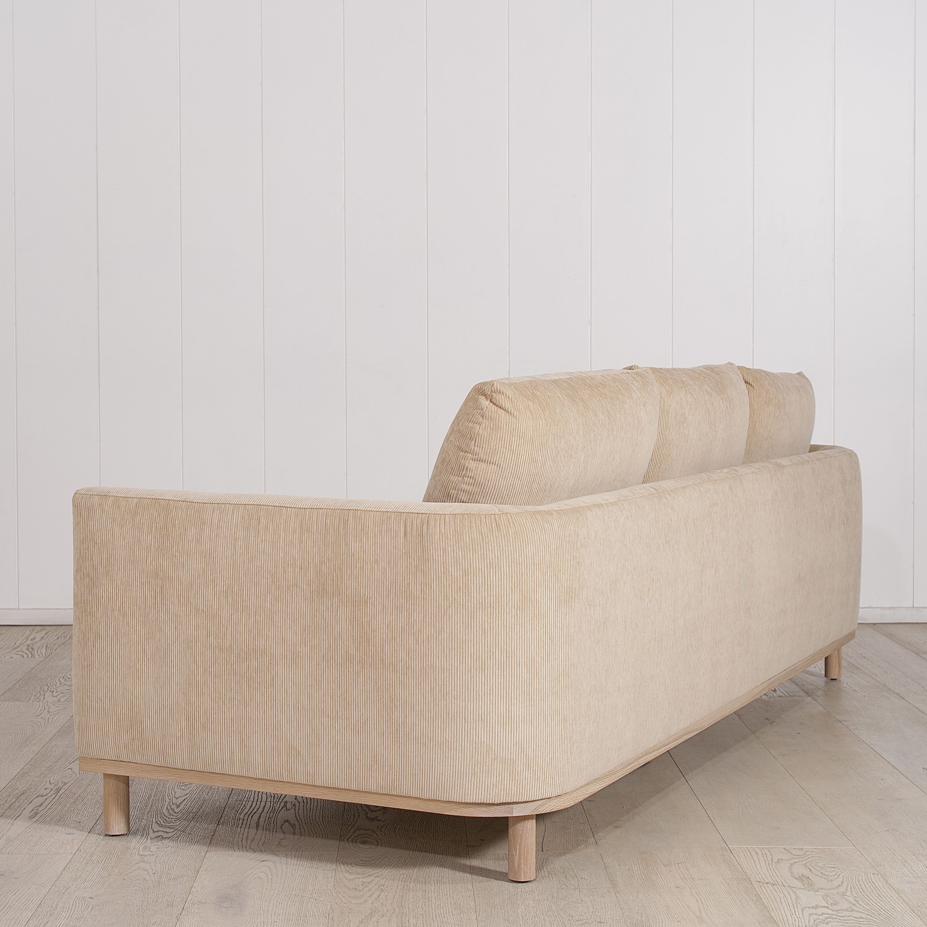 As Shown: 110"W x 38"D x 34"H | Style: Upholstered | Fabric: Mila Cashew | Finish: Natural