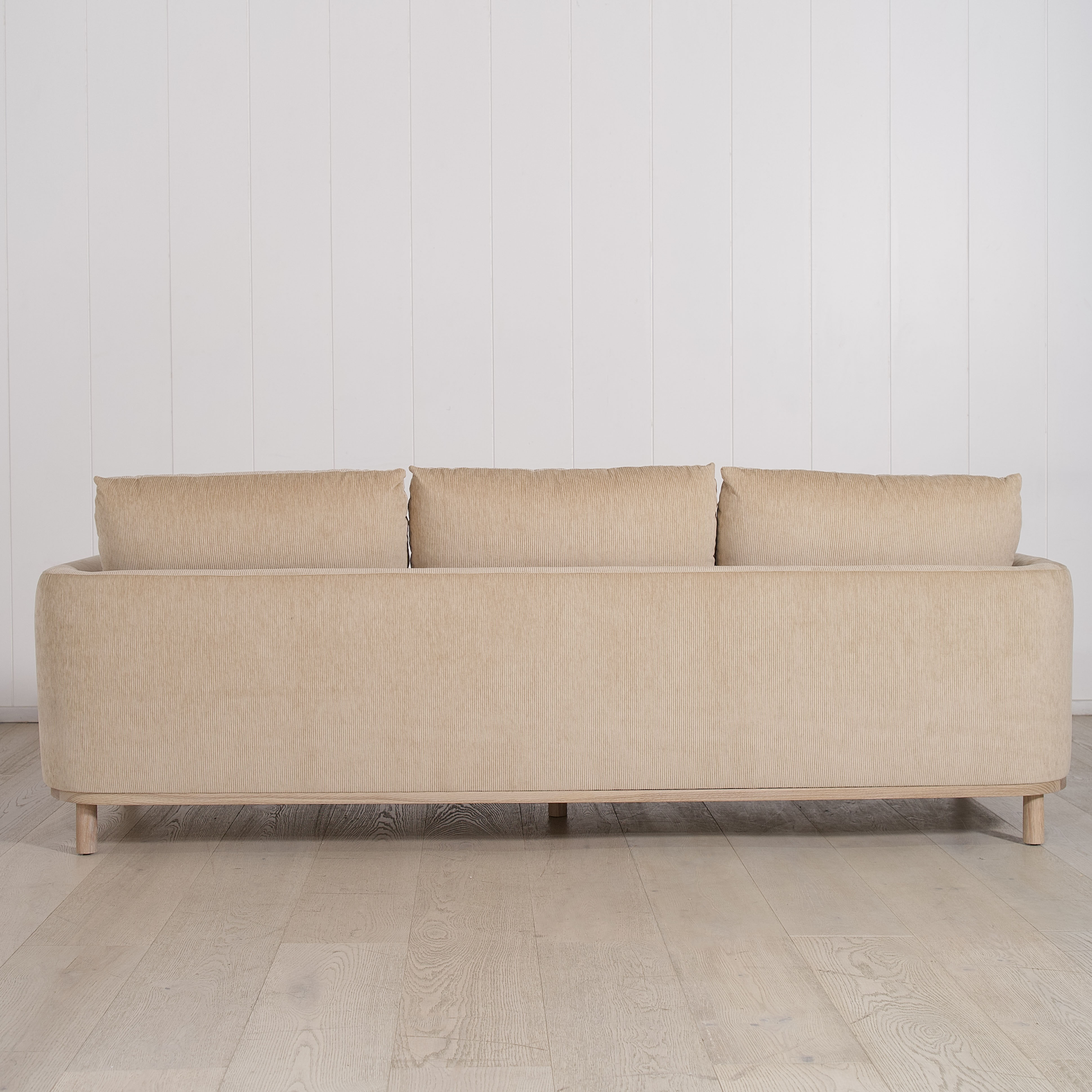 As Shown: 110"W x 38"D x 34"H | Style: Upholstered | Fabric: Mila Cashew | Finish: Natural