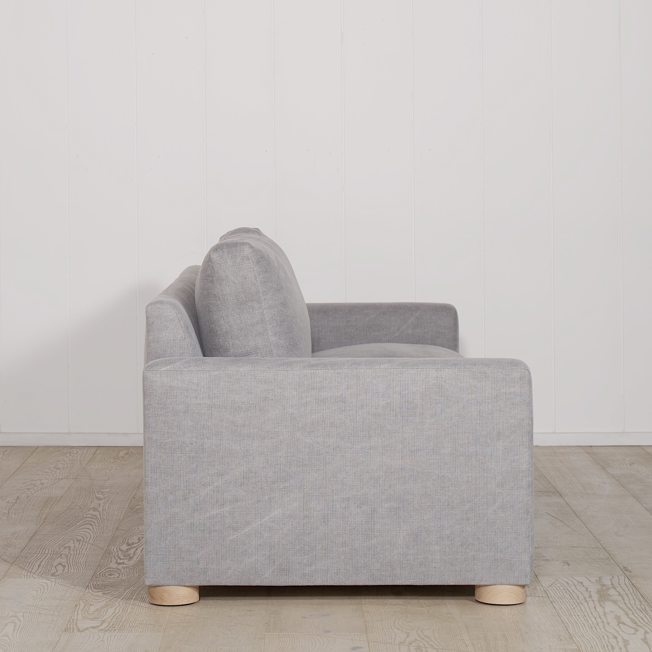 As Shown: in COM fabric, oak legs finished in Mint White Natural.