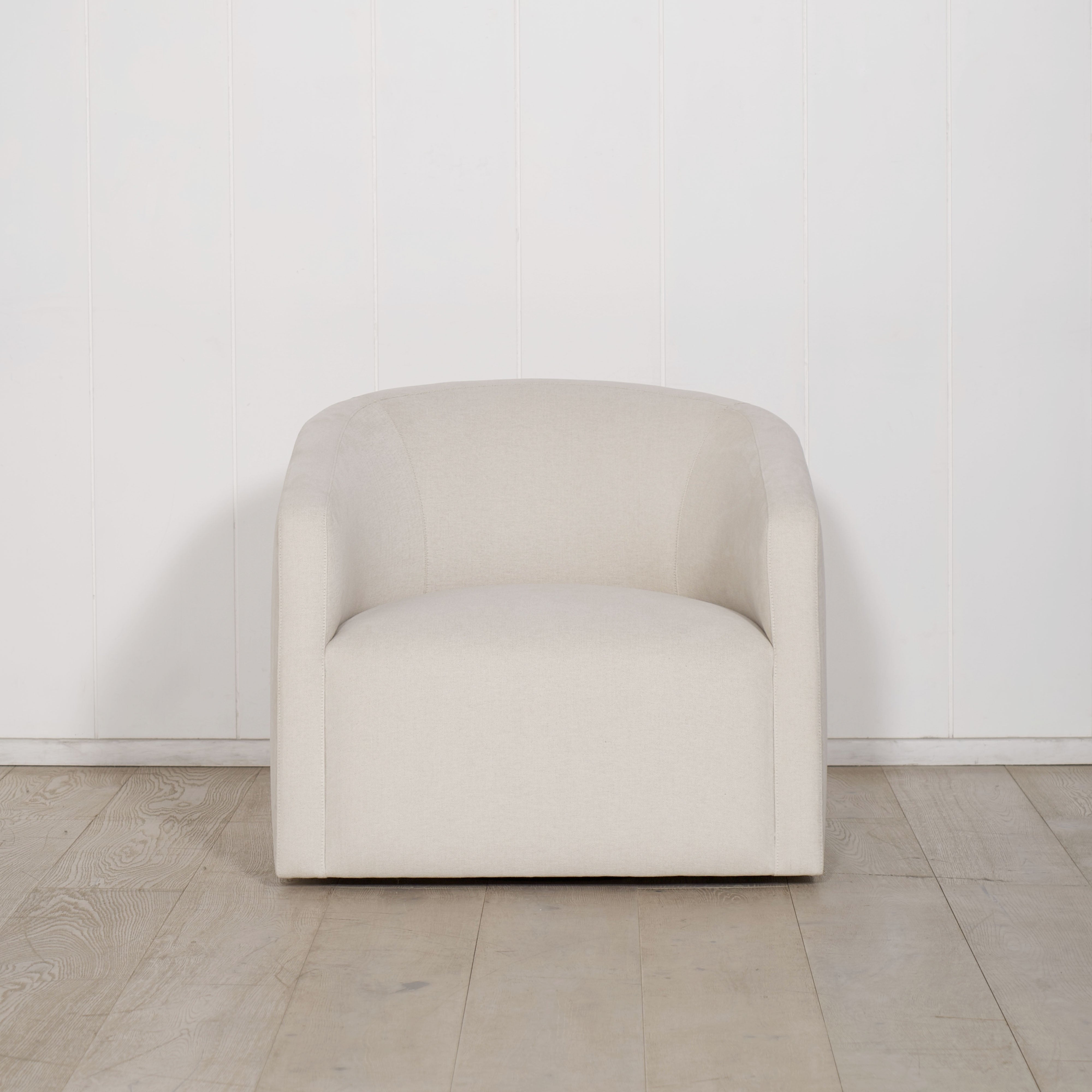 As Shown: in upholstered Parker Sand, swivel.