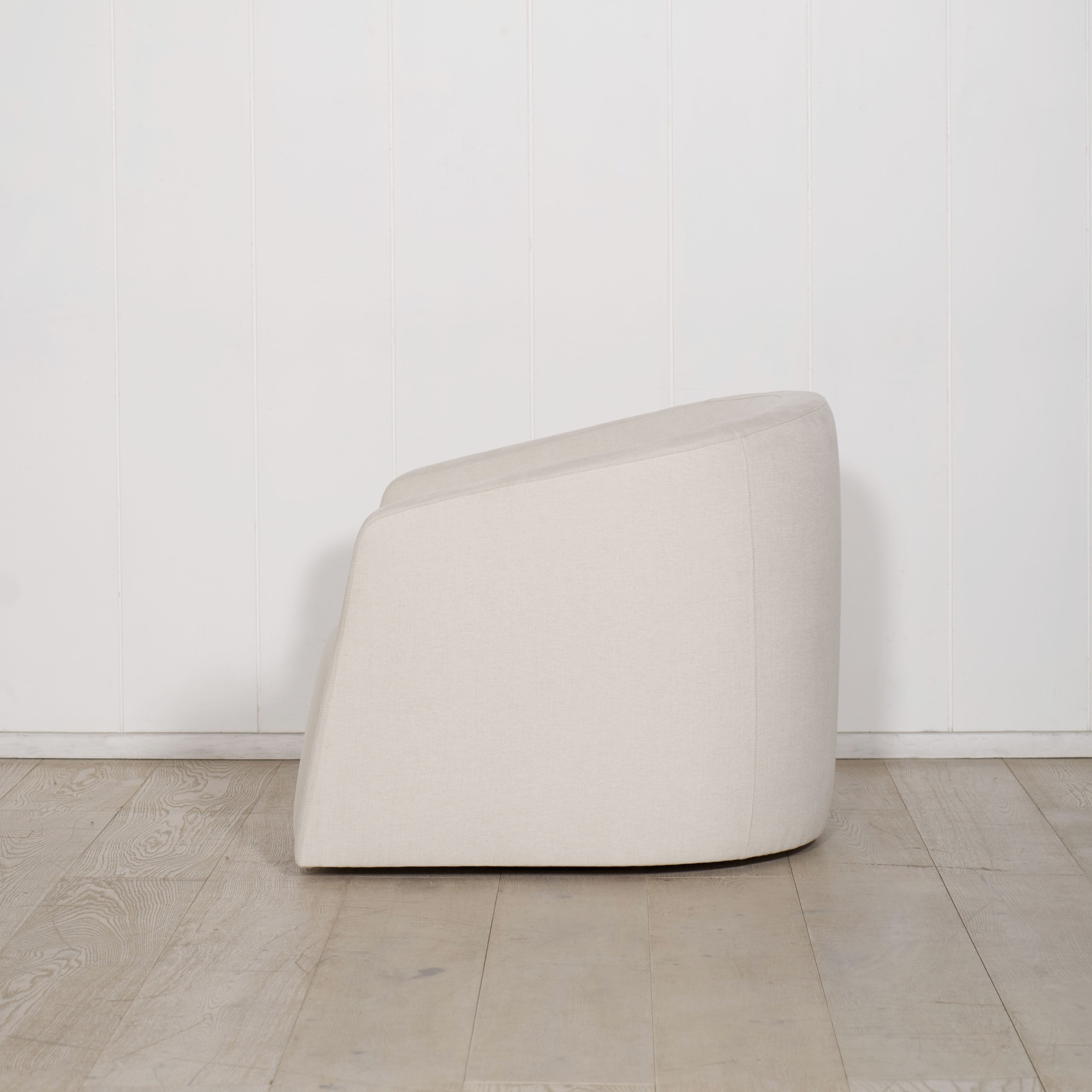 As Shown: in upholstered Parker Sand, swivel.