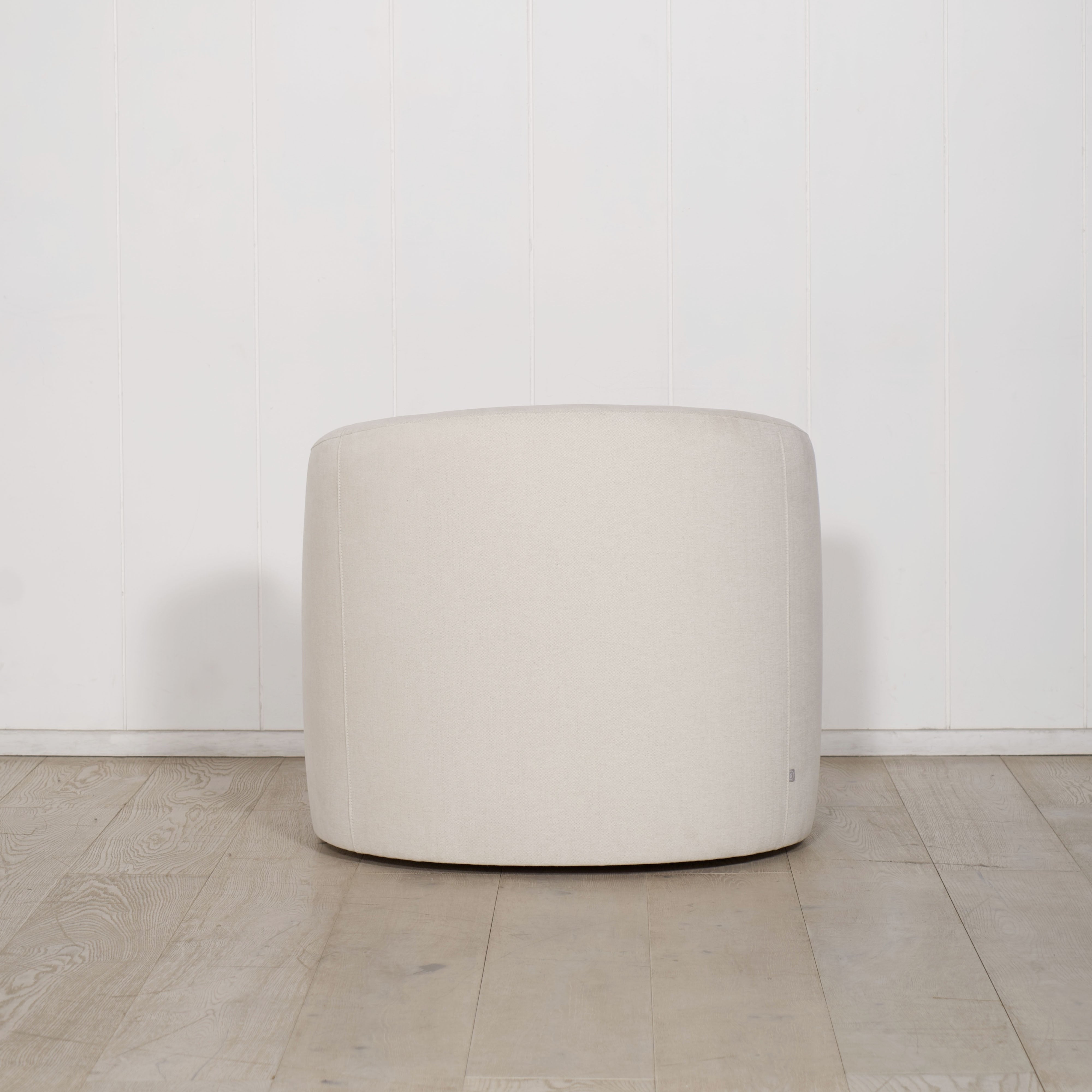 As Shown: in upholstered Parker Sand, swivel.