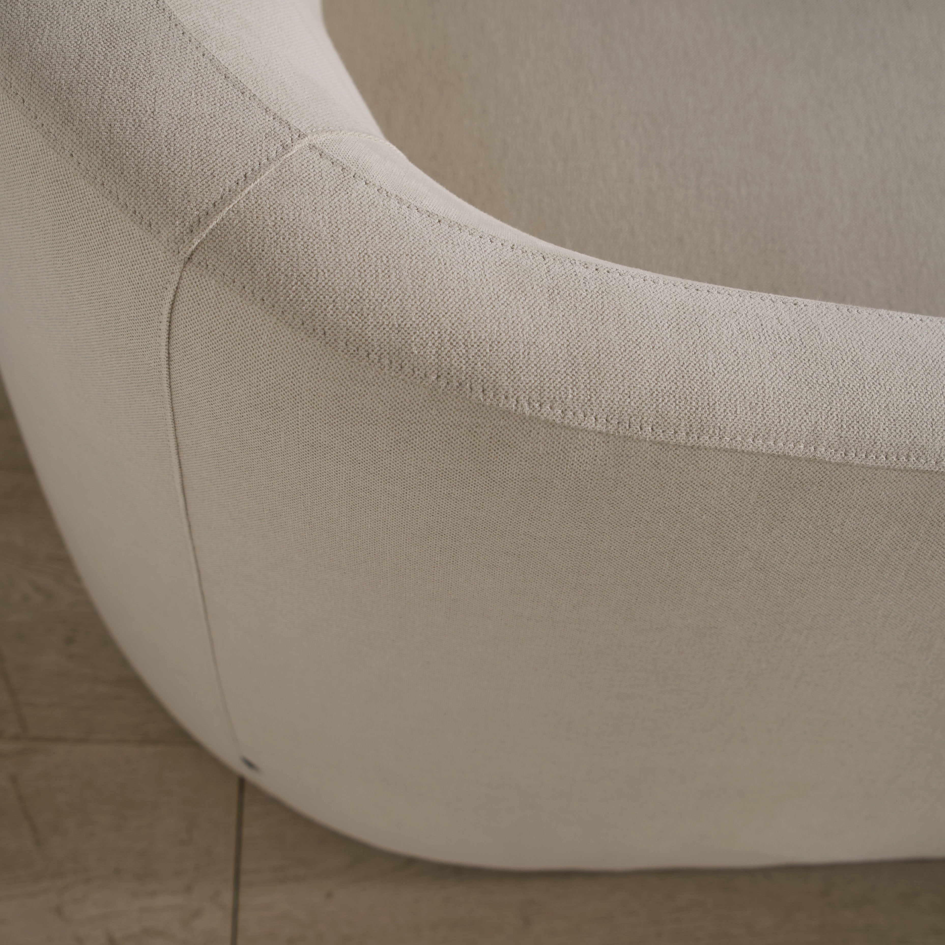 As Shown: in upholstered Parker Sand, swivel.