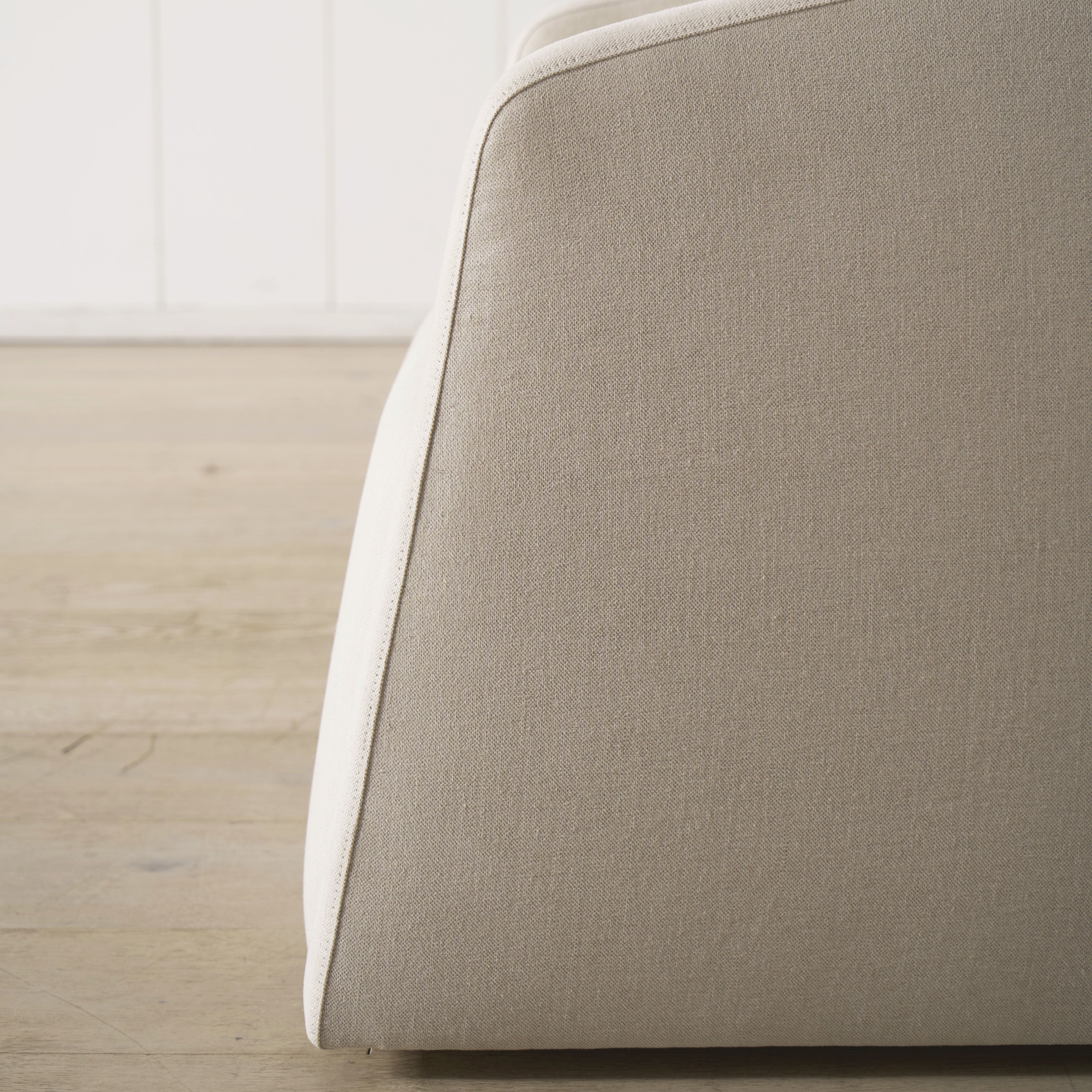 As Shown: in upholstered Parker Sand, swivel.