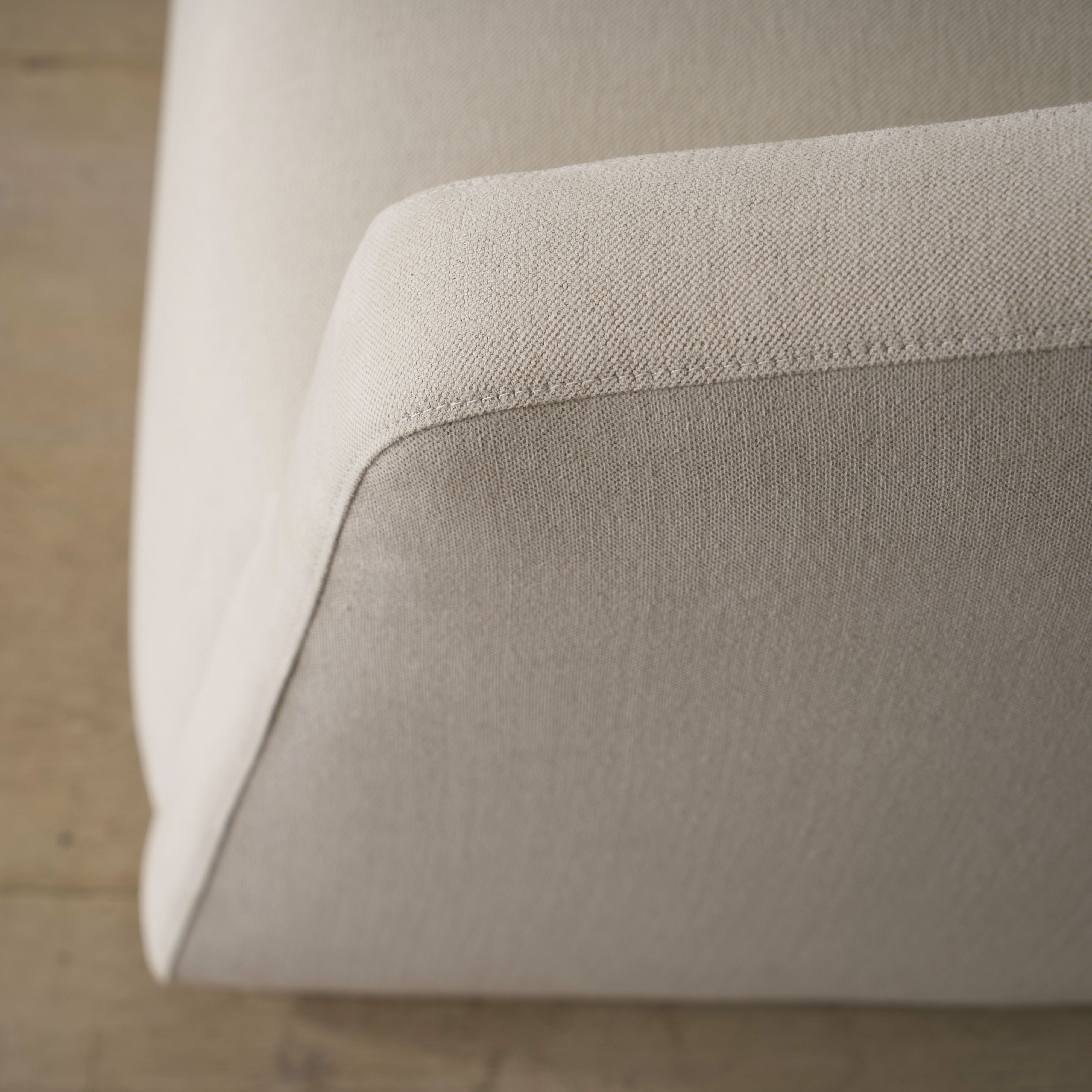 As Shown: in upholstered Parker Sand, swivel.