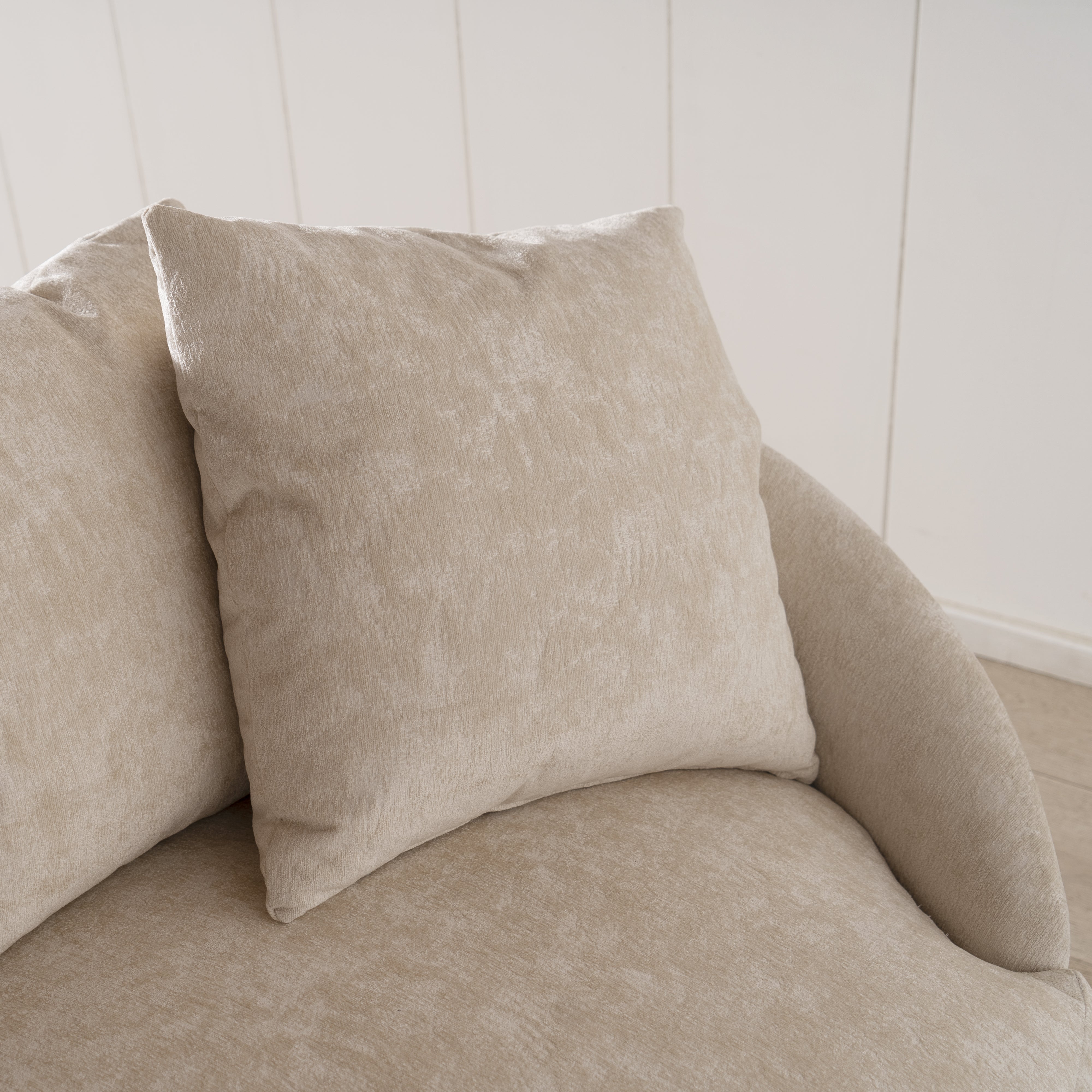 As Shown: in upholstered Zion Custard, oak legs finished in Mint White Natural.
