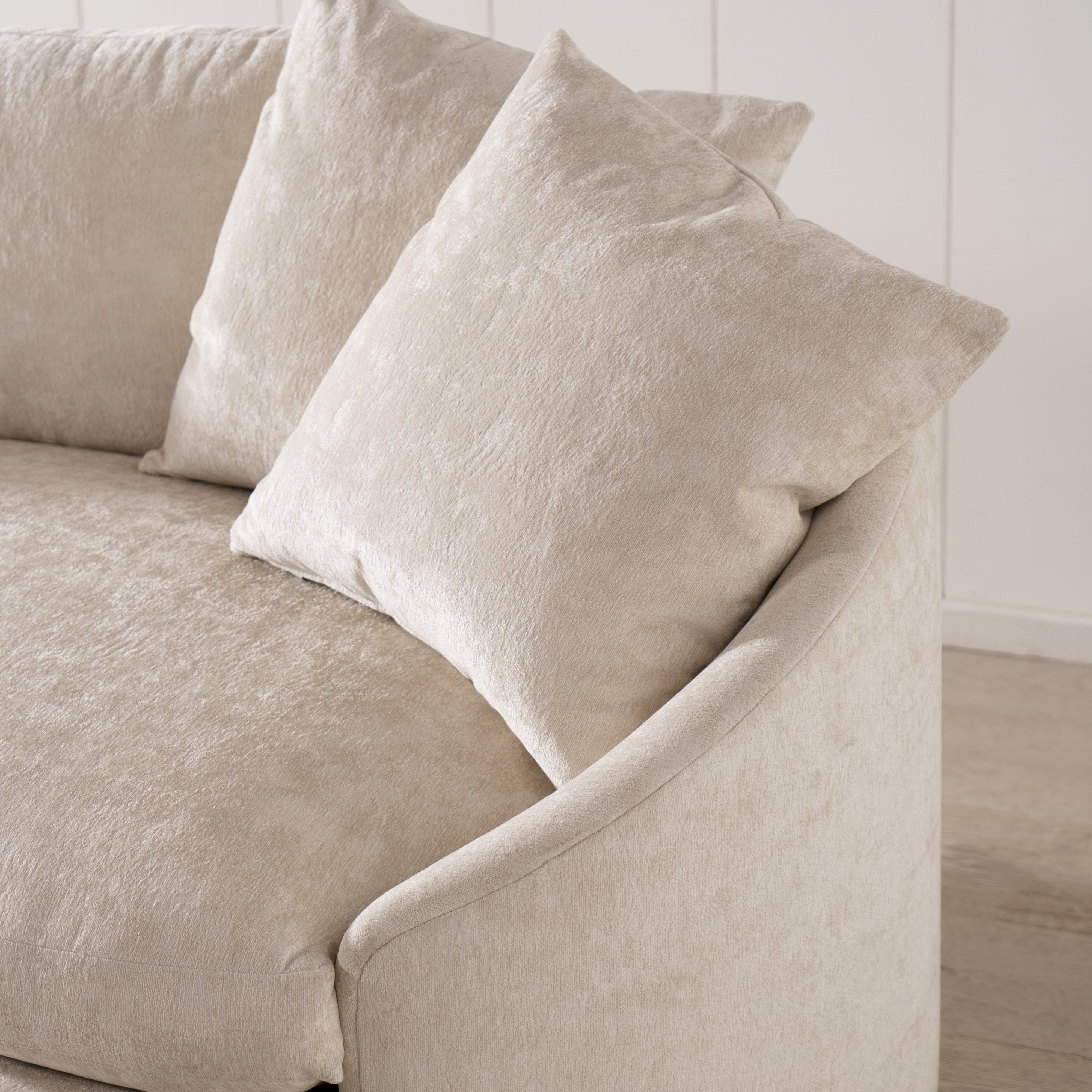 As Shown: in upholstered Zion Custard, oak legs finished in Mint White Natural.