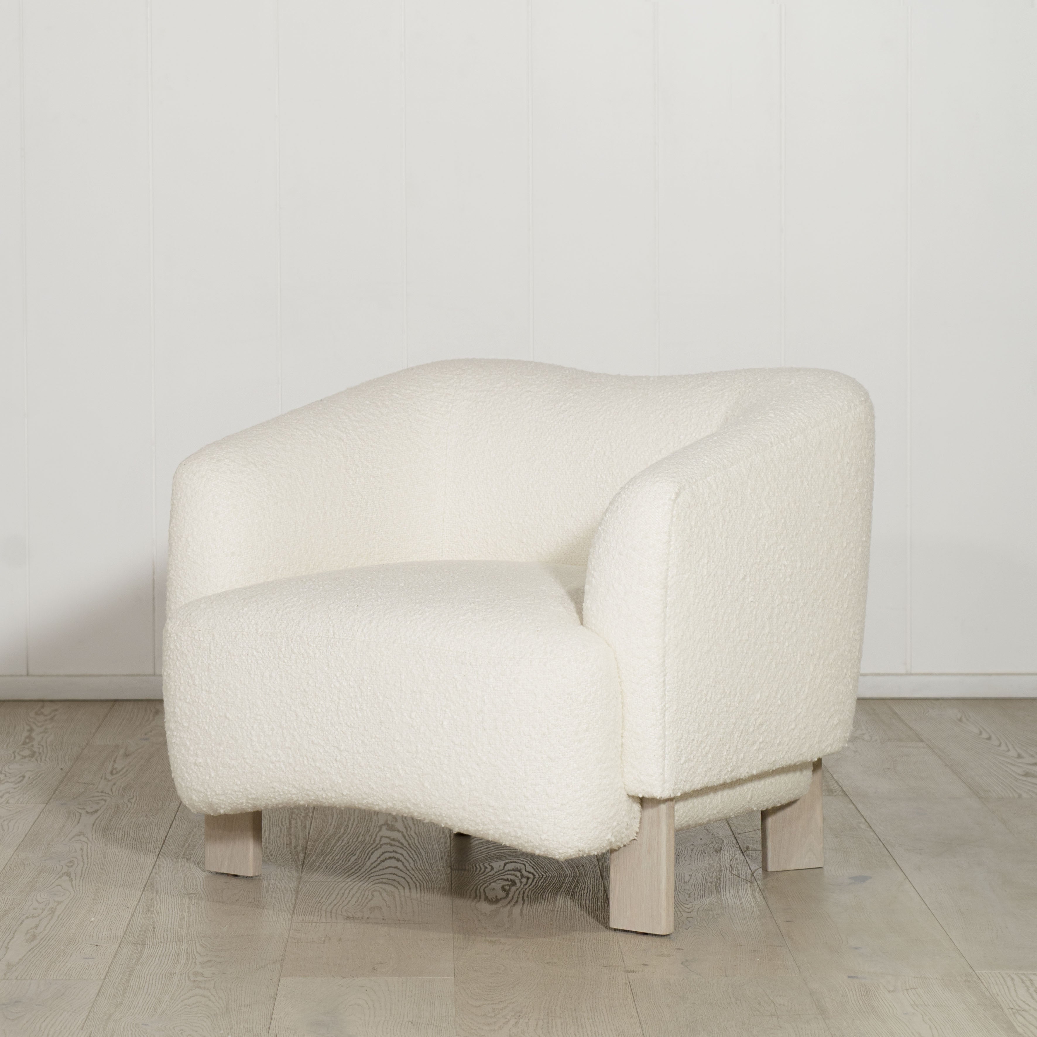 As Shown: in Berber White. Oak legs finished in Mint White Super White