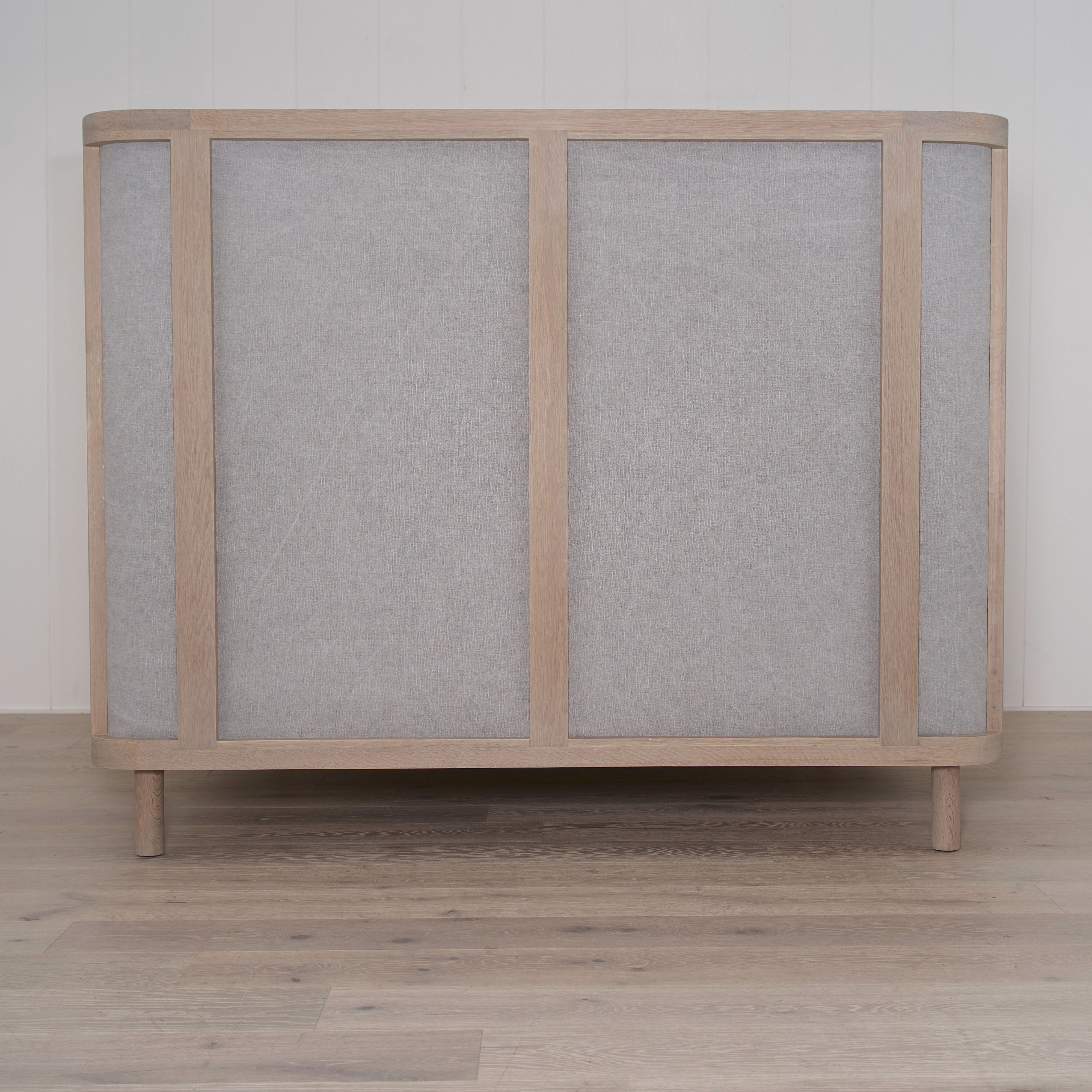 As Shown: in COM fabric, oak in custom finish