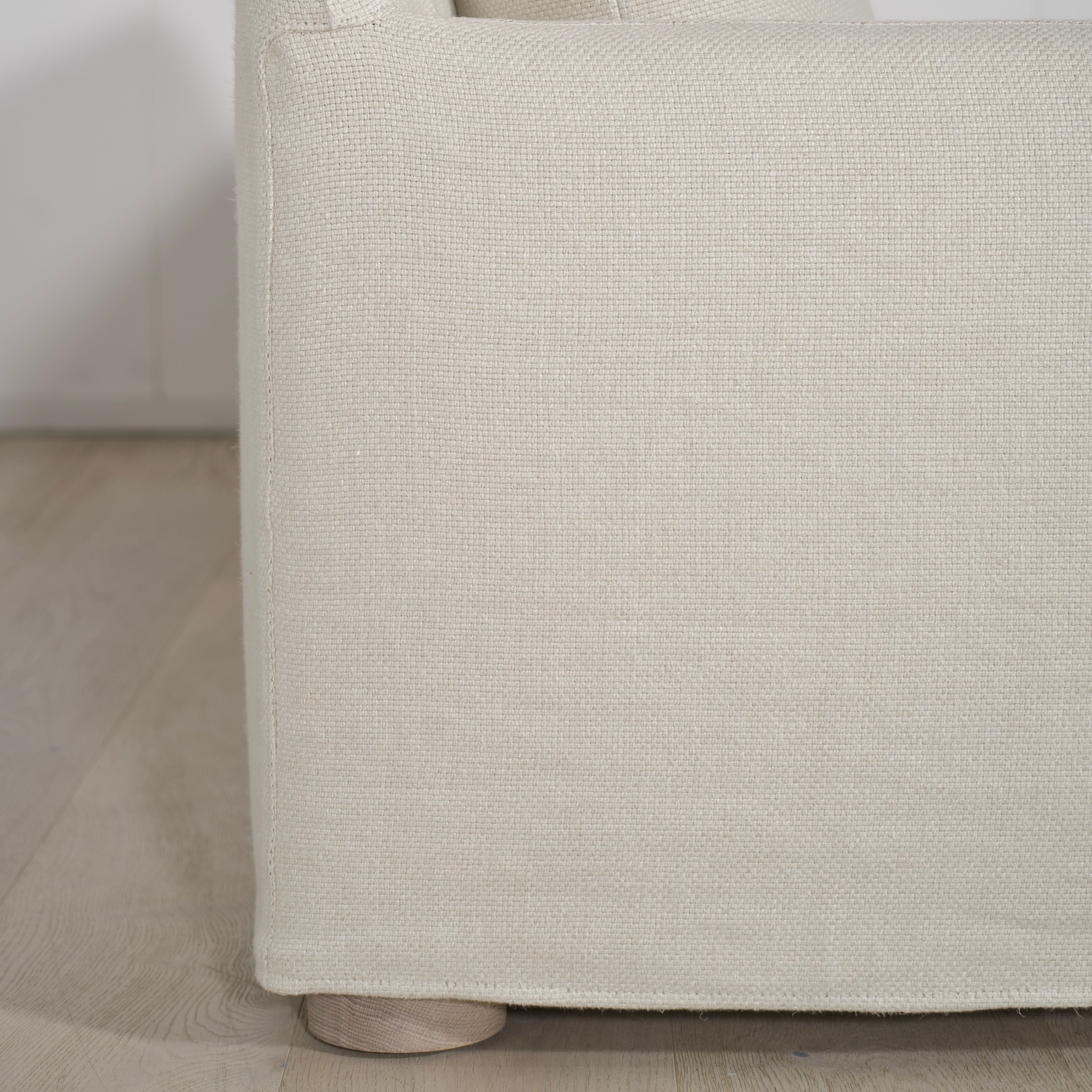 As Shown: Slipcovered in Monte Natural with legs finishing in Mint White Natural