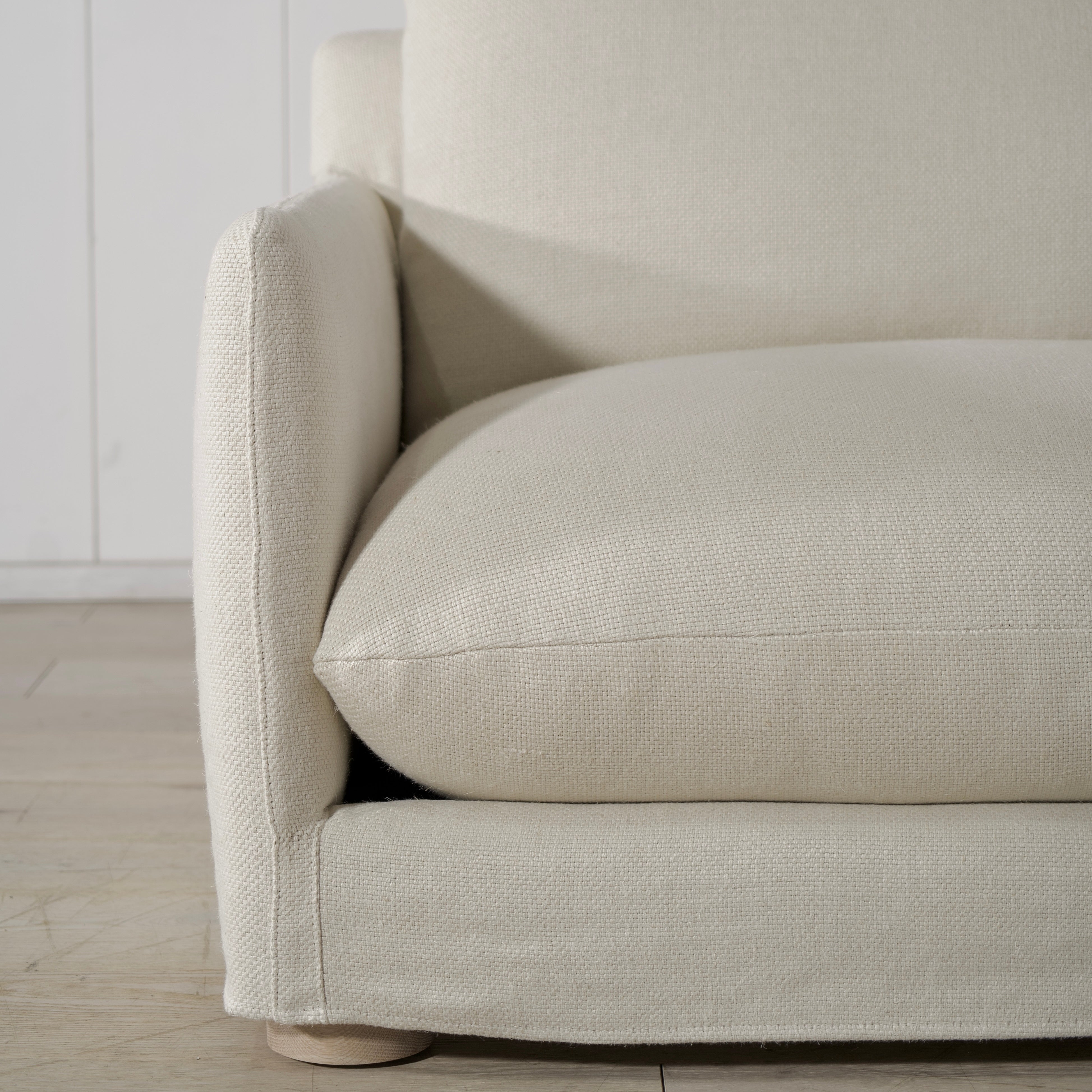 As Shown: Slipcovered in Monte Natural with legs finishing in Mint White Natural