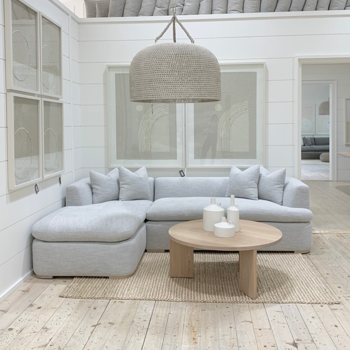 As Shown: Upholstered in COM with Lincoln Parchment seat cushions and pillows. Last variant in Belgian Sky Blue.Oak legs finished in Mint White Natural.