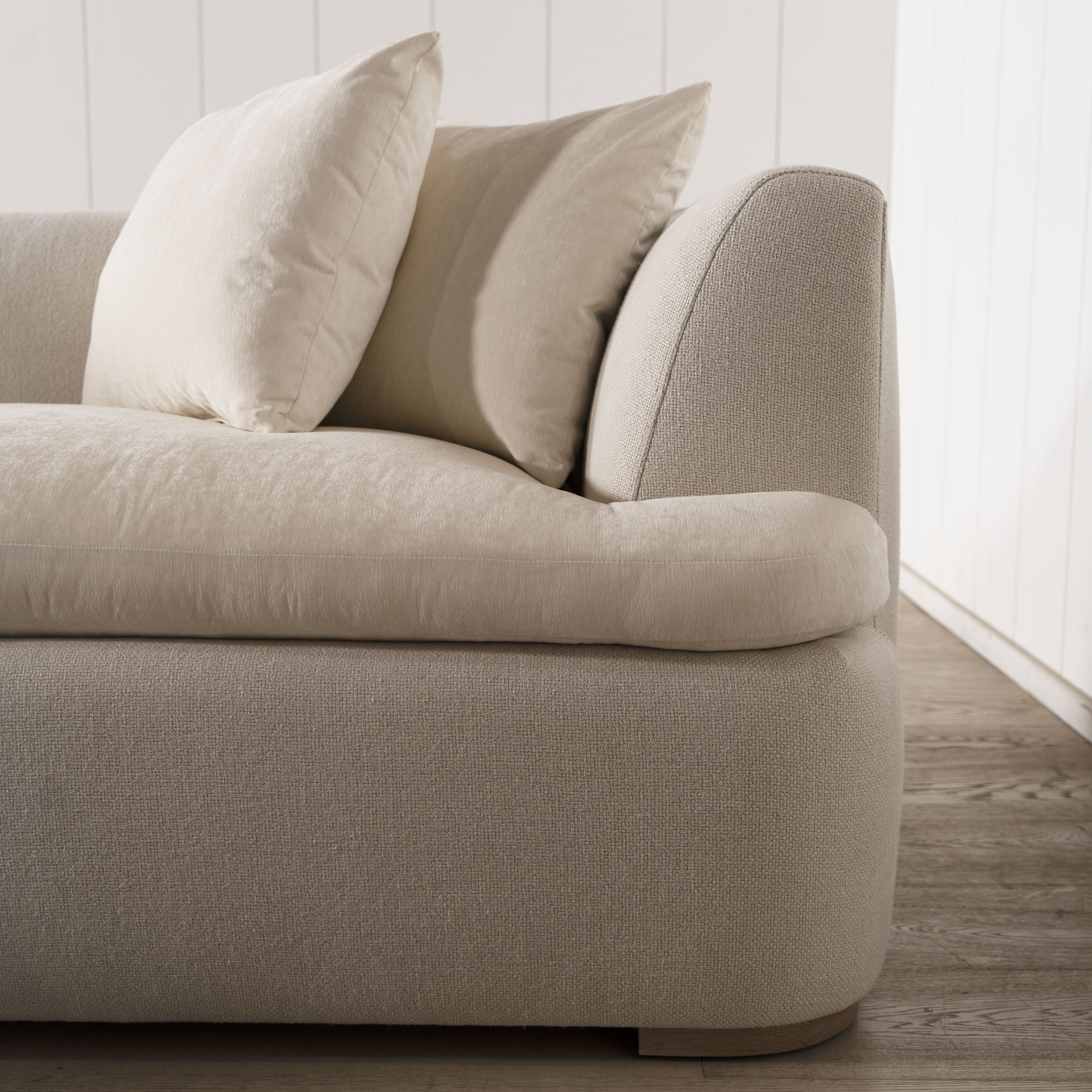 As Shown: Upholstered in COM with Lincoln Parchment seat cushions and pillows. Last variant in Belgian Sky Blue.Oak legs finished in Mint White Natural.