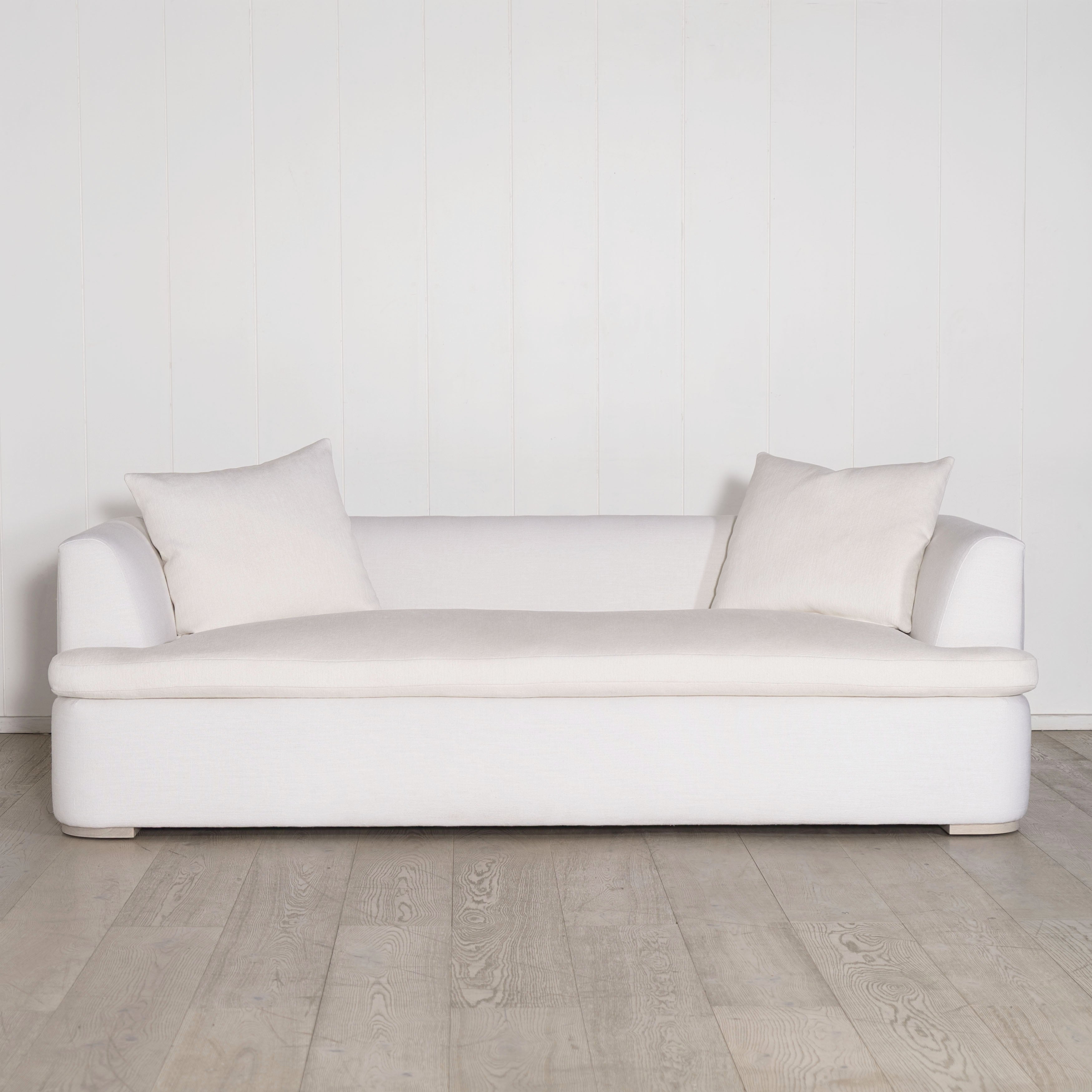 As Shown: in com fabrics, oak legs finished in Mint White Natural.