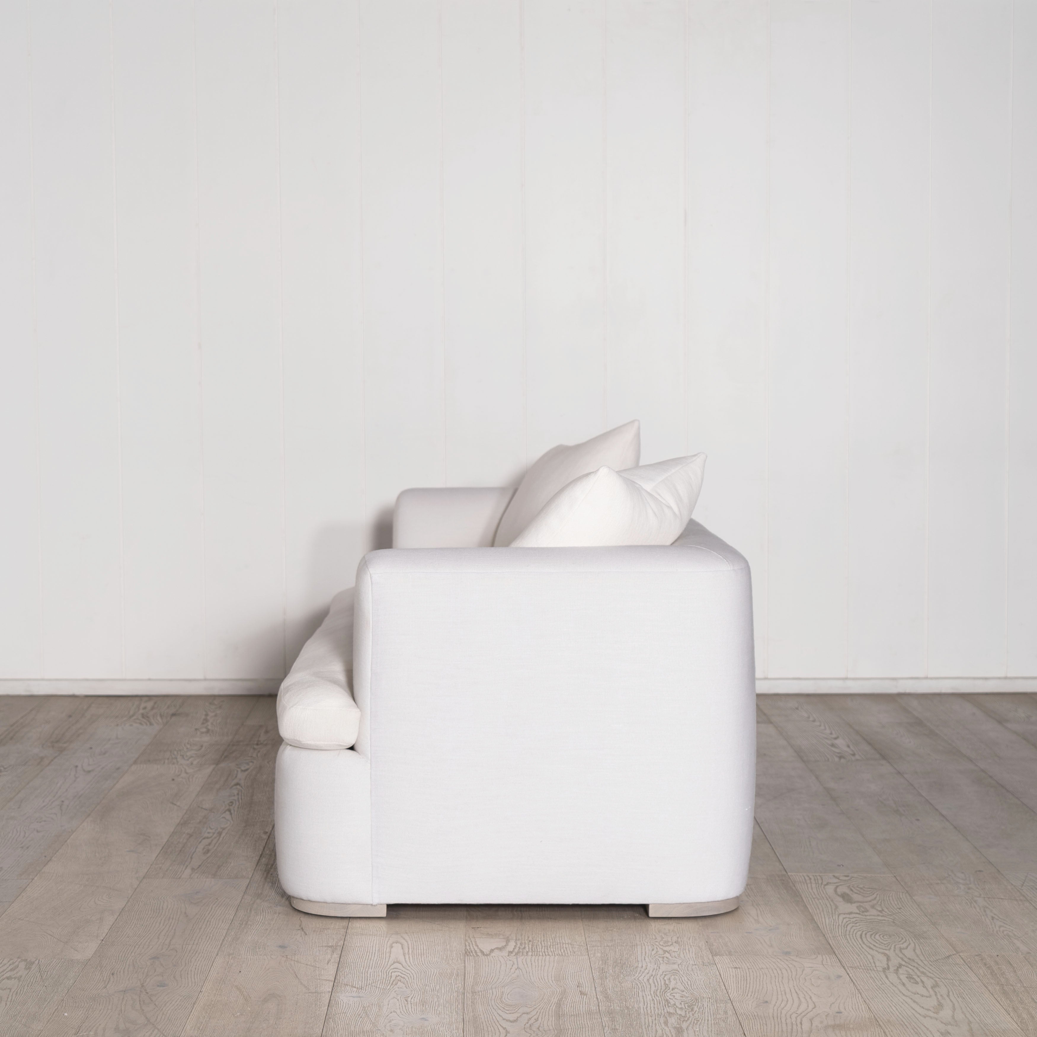 As Shown: in com fabrics, oak legs finished in Mint White Natural.