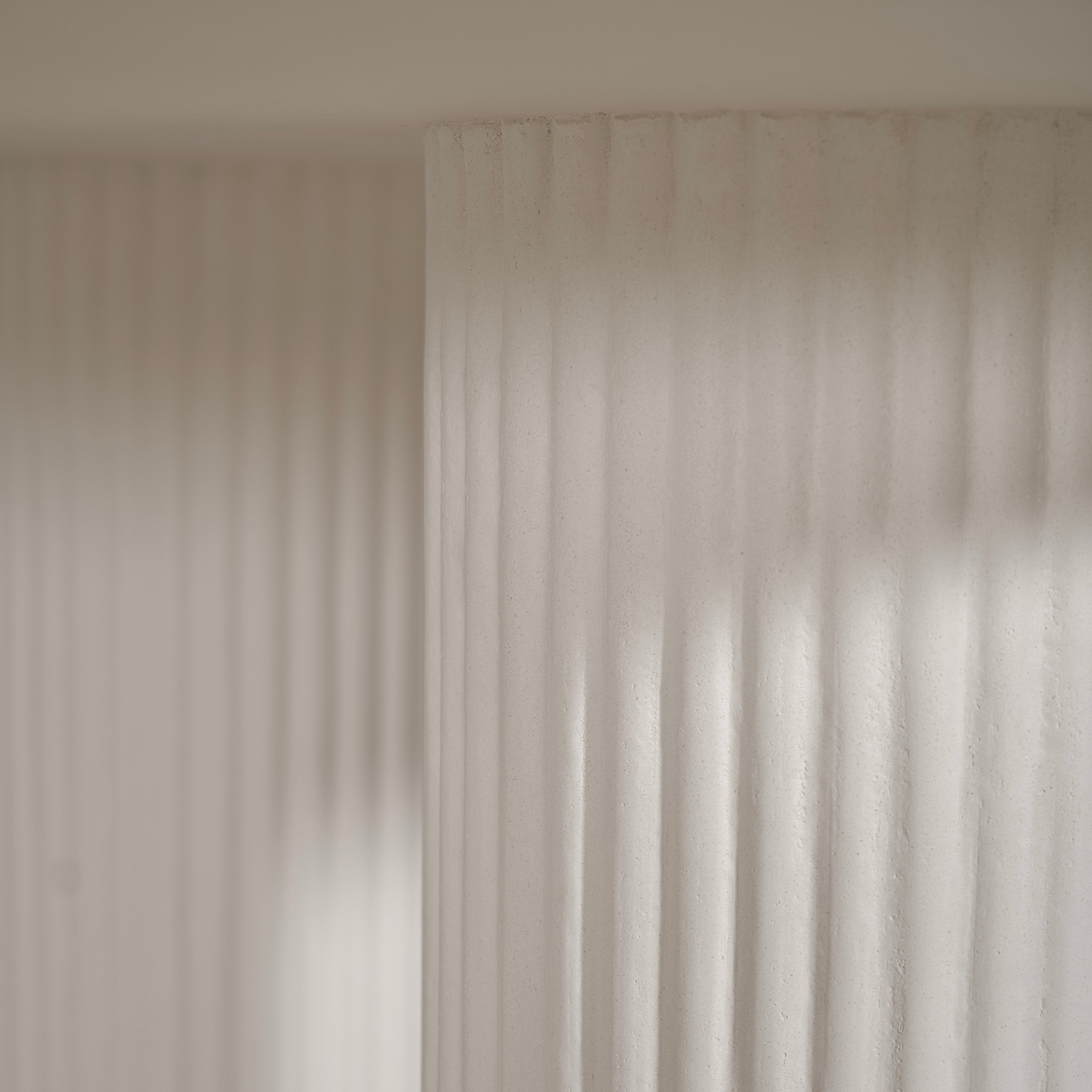 As Shown: 8 step limestone micro coat, White.