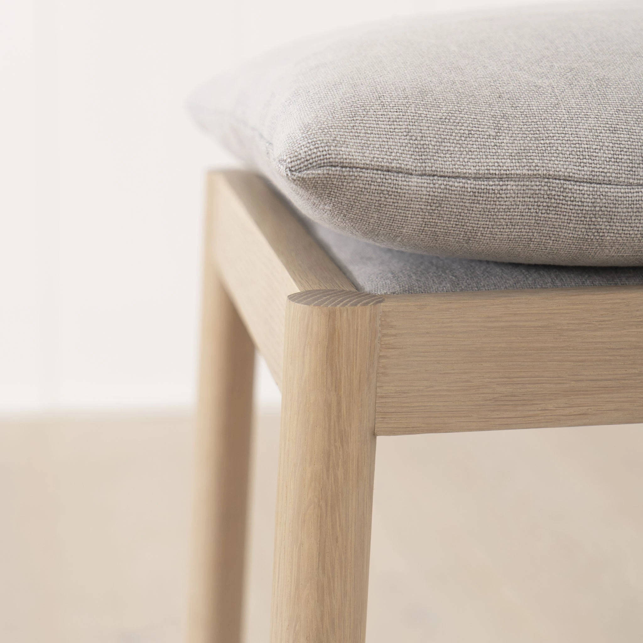 As Shown: in Mint White Natural with COM fabric cushion.