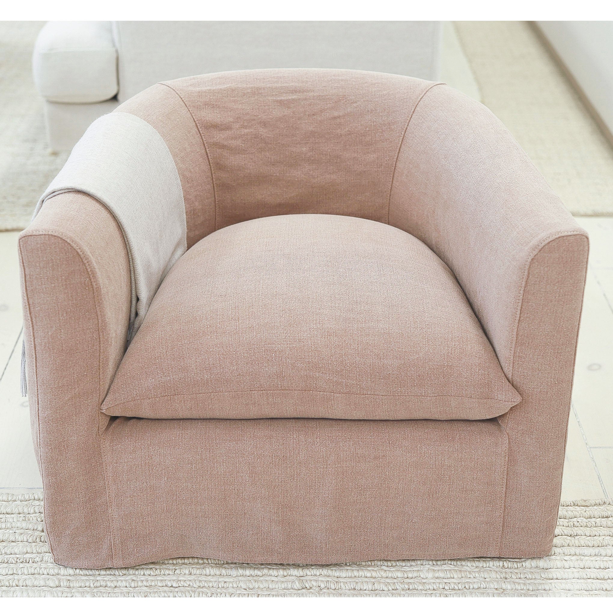 As Shown: in swivel, slipcovered Granby Clay