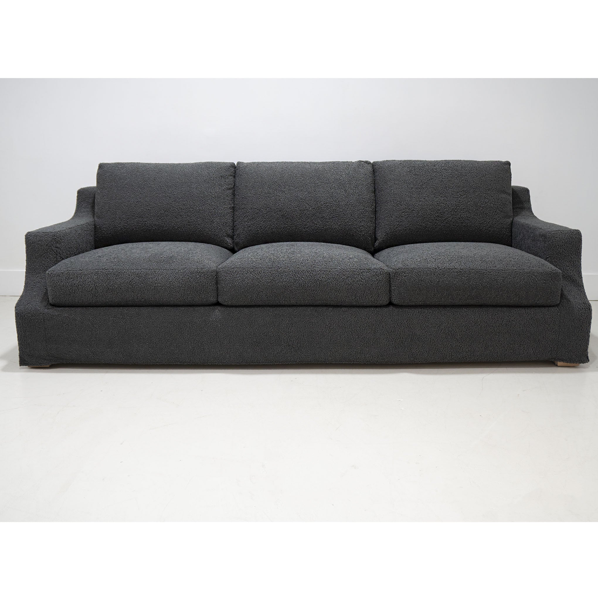 As Shown: in slipcovered Nomad Snow. And slipcovered Sheepskin Charcoal.
