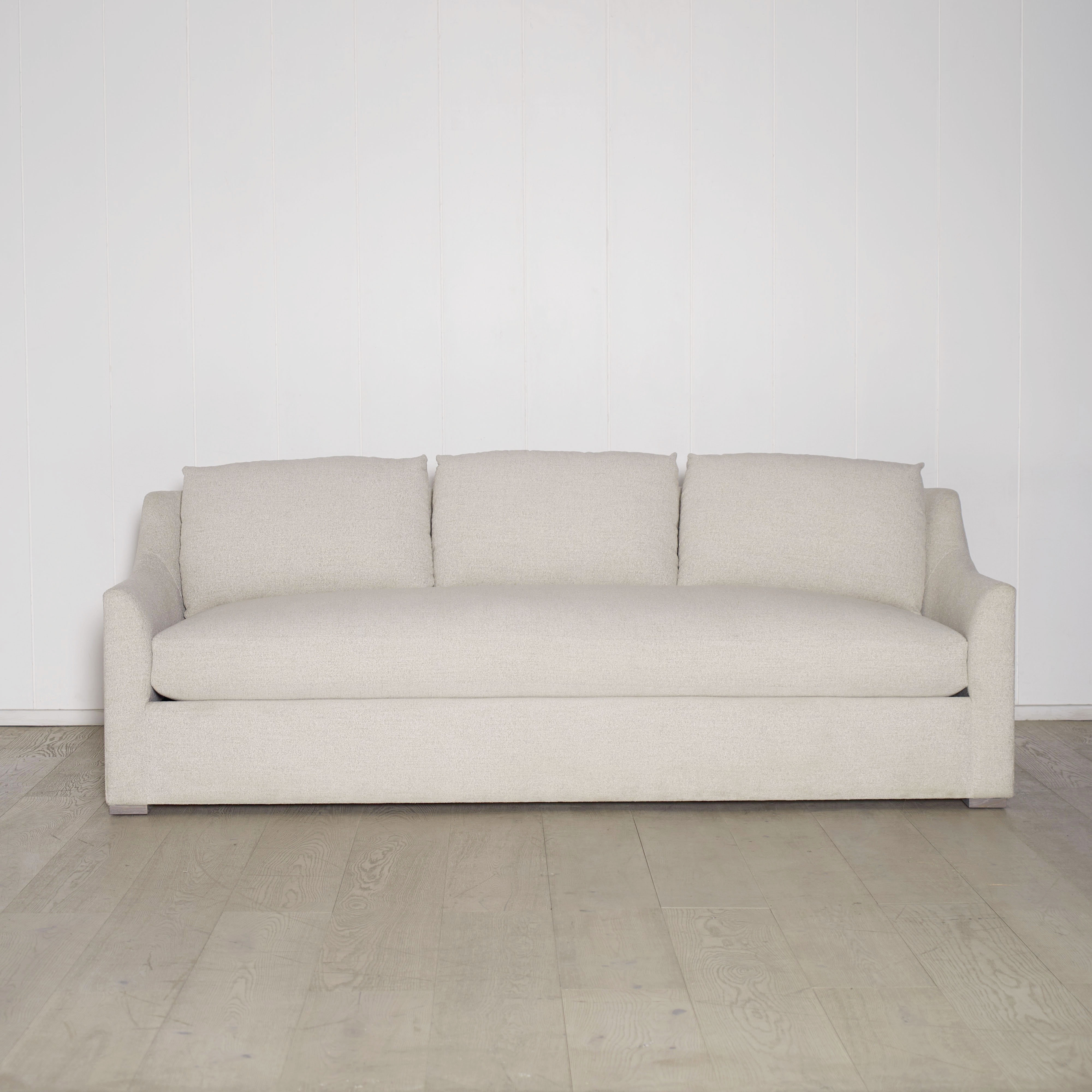 As Shown: Slipcovered in COM with a 3 over 1 Cushion Configuration