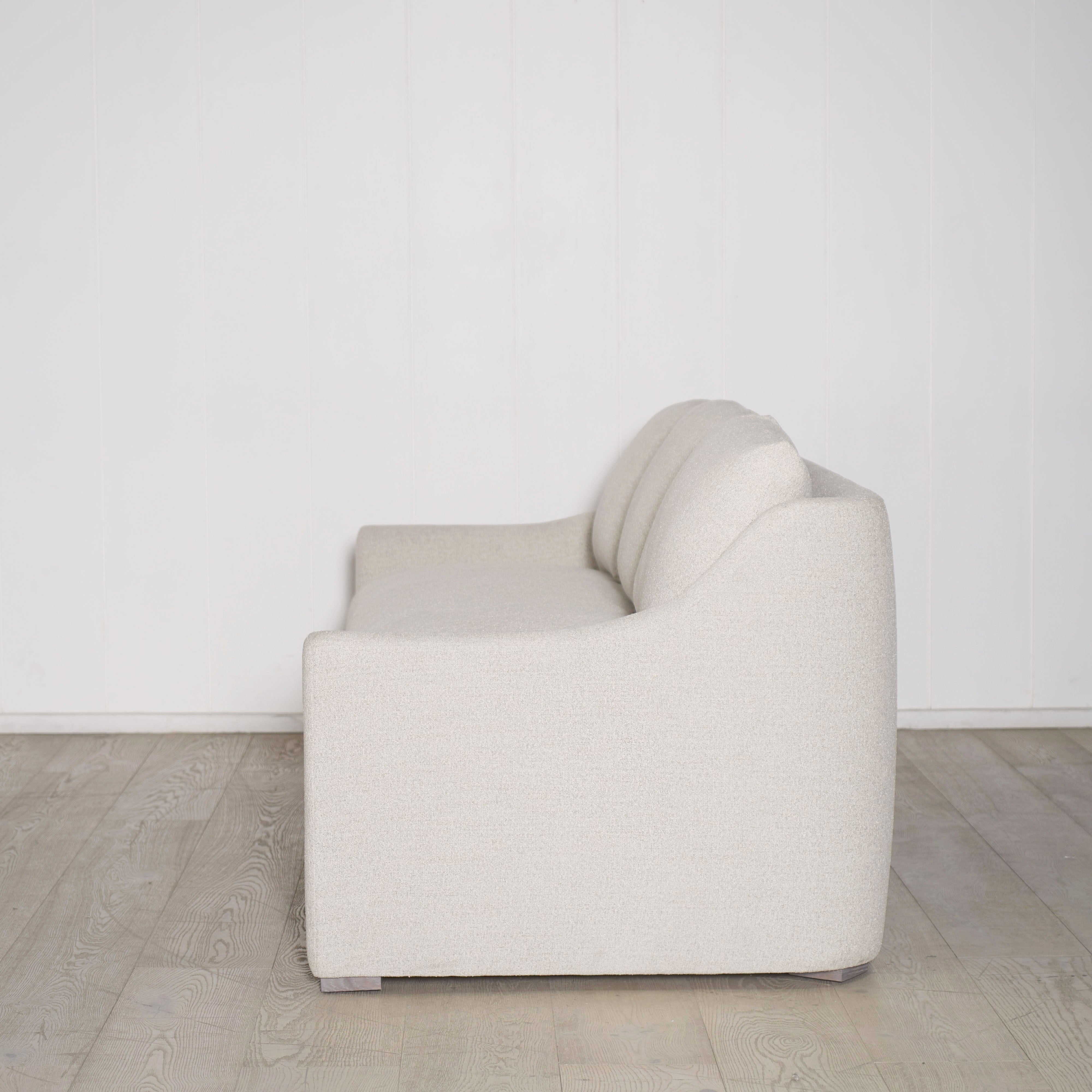 As Shown: Slipcovered in COM with a 3 over 1 Cushion Configuration