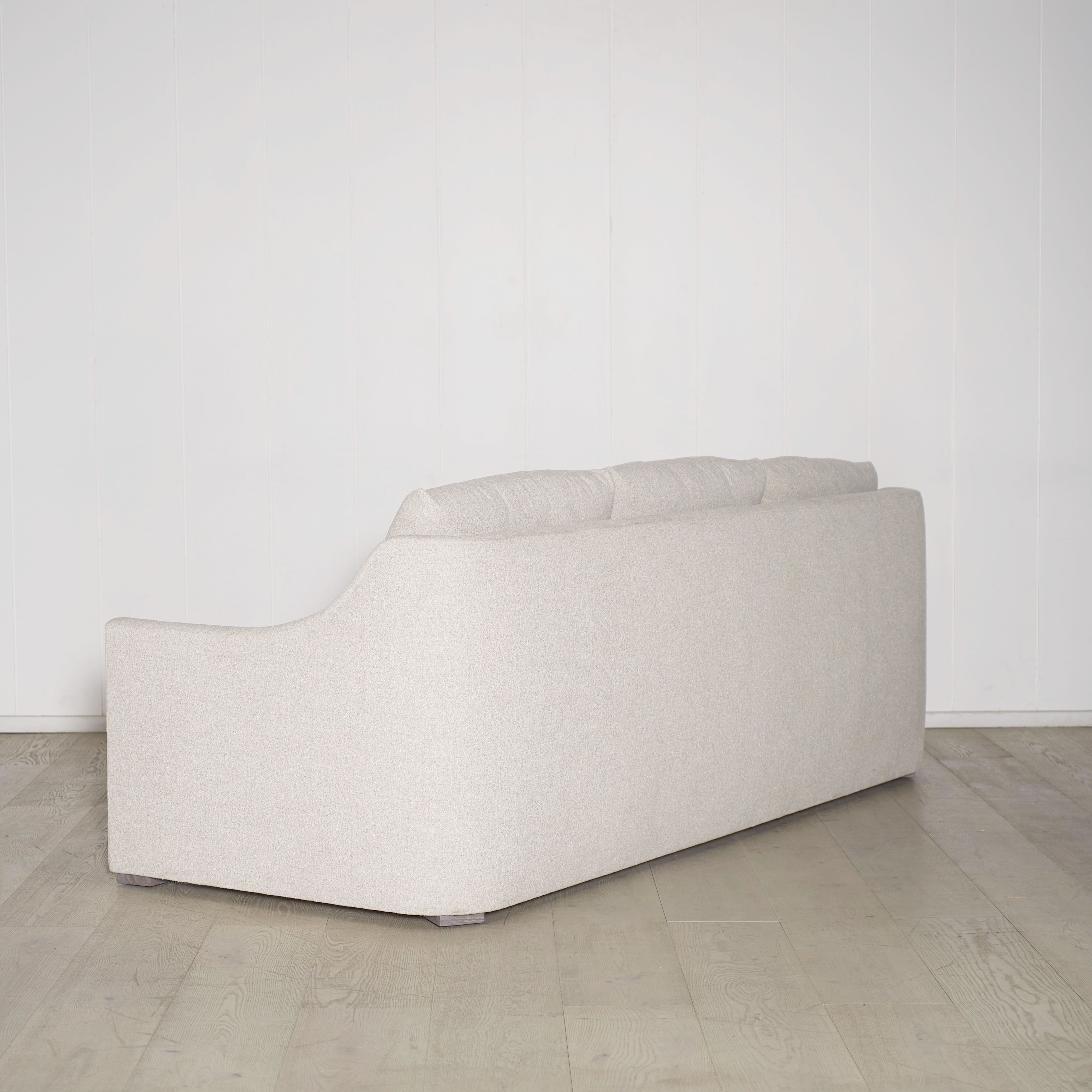 As Shown: Slipcovered in COM with a 3 over 1 Cushion Configuration