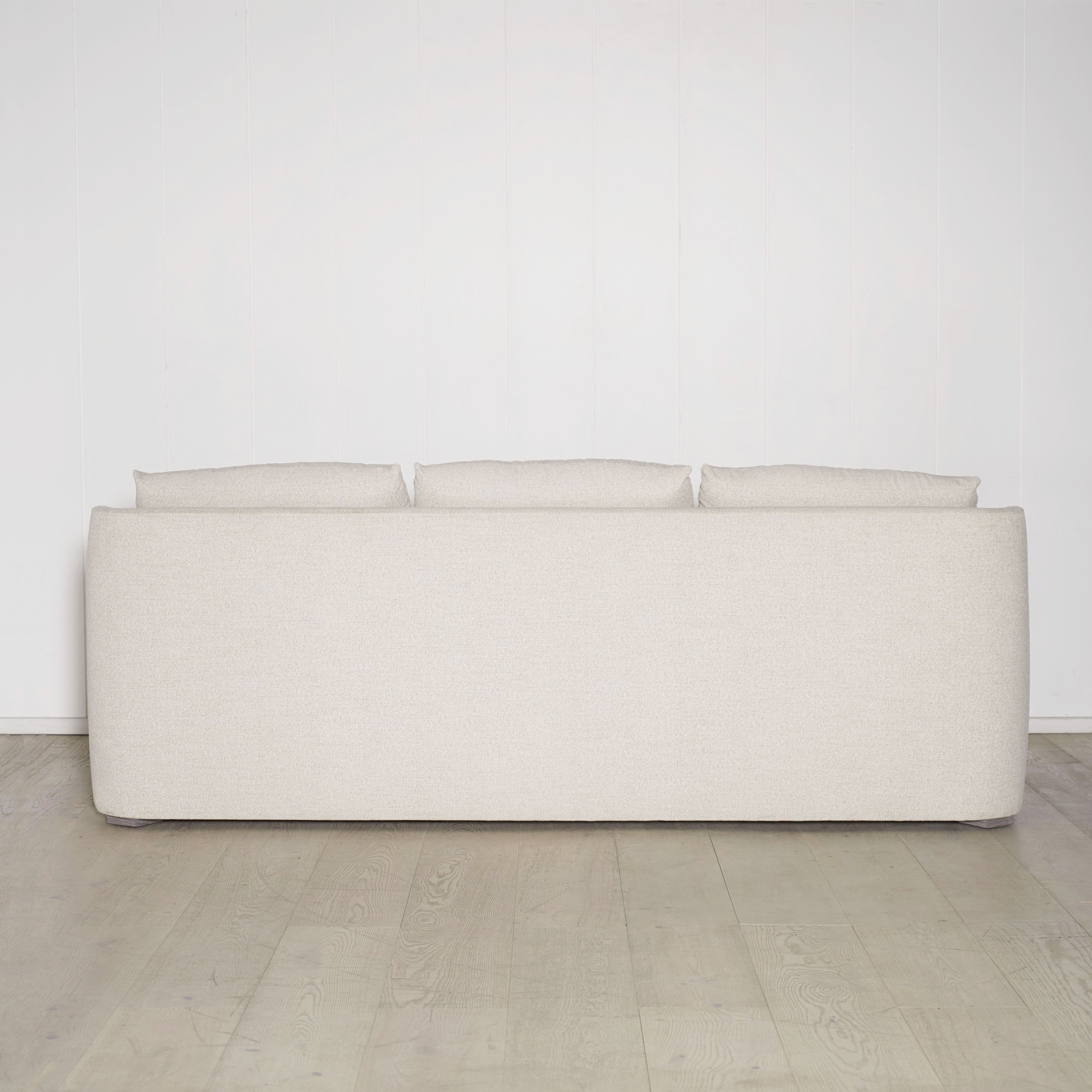 As Shown: Slipcovered in COM with a 3 over 1 Cushion Configuration