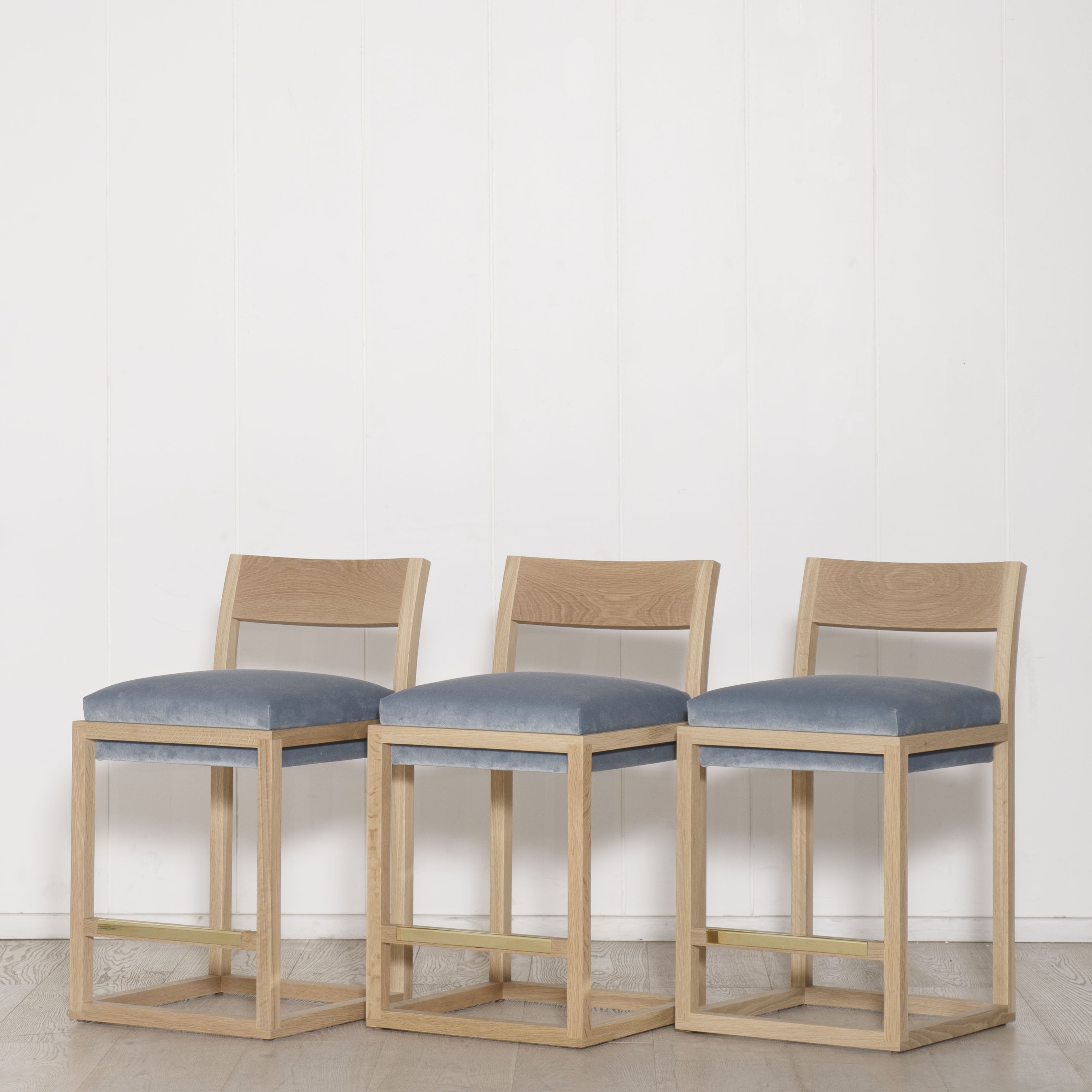 As Shown: Counter height: 18"W x 20"D x 33"H | Fabric: COM Sky Steel | Finish: Natural