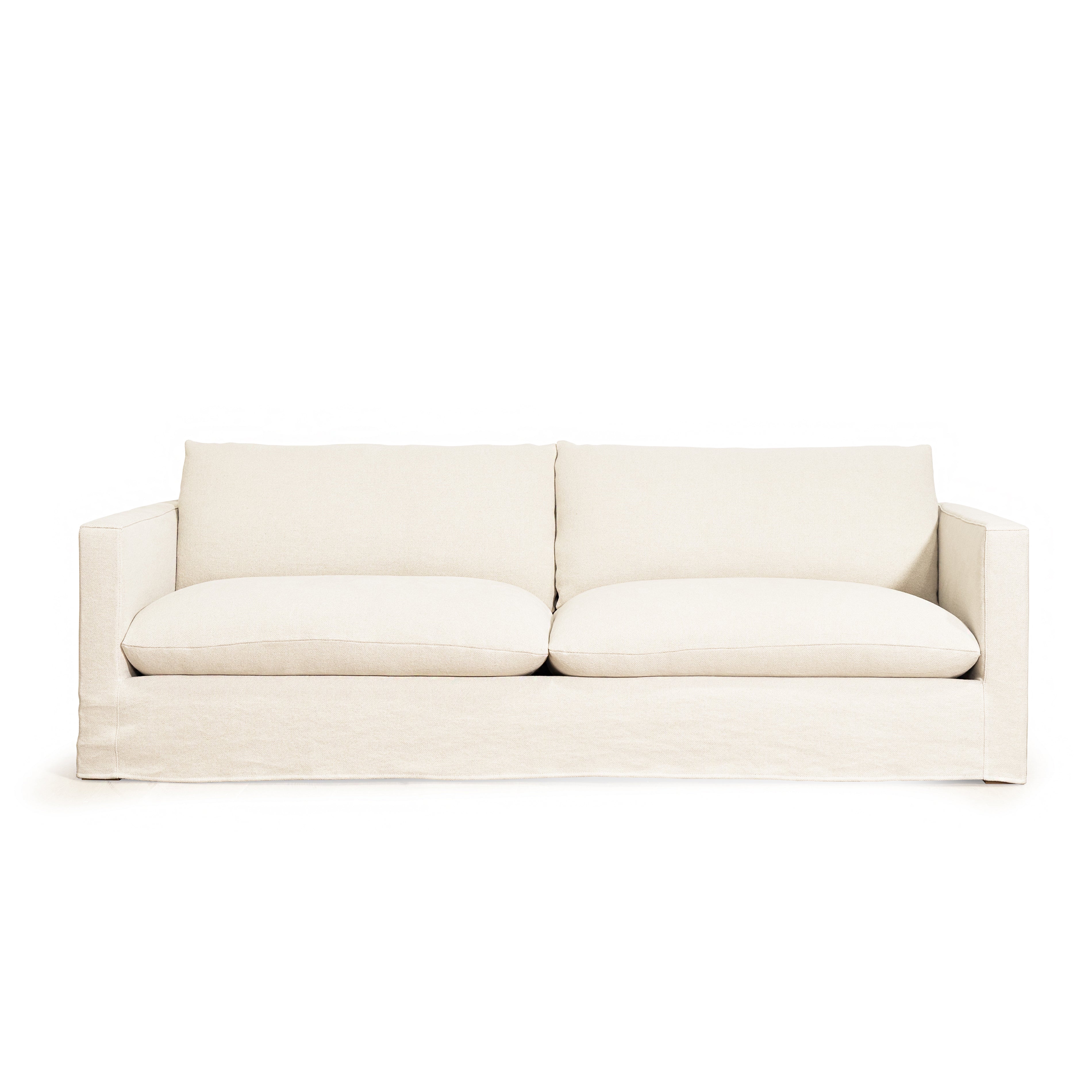 As Shown: Slipcovered in Frame Natural with a 2 over 2 Cushion Configuration