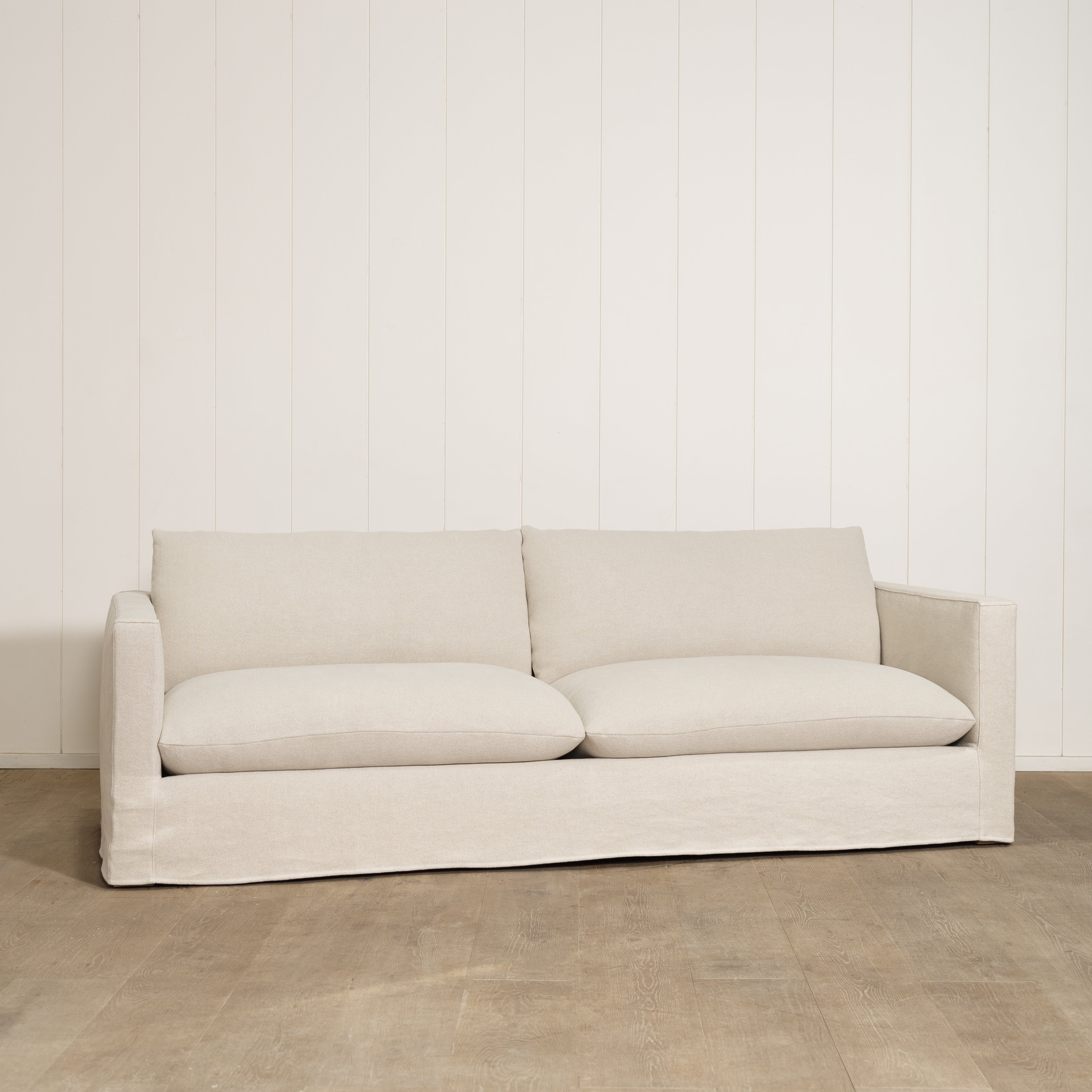 As Shown: Slipcovered in Frame Natural with a 2 over 2 Cushion Configuration