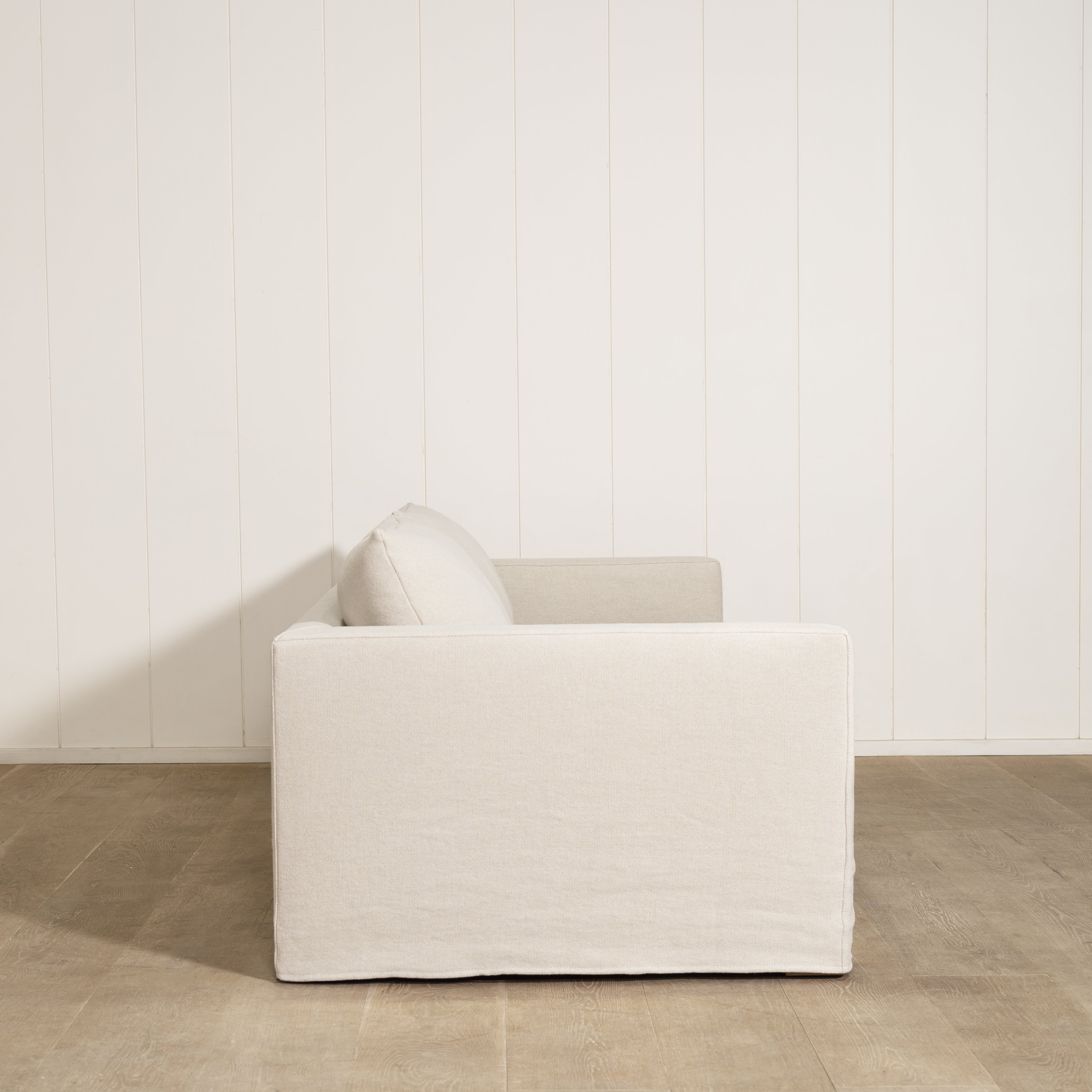 As Shown: Slipcovered in Frame Natural with a 2 over 2 Cushion Configuration