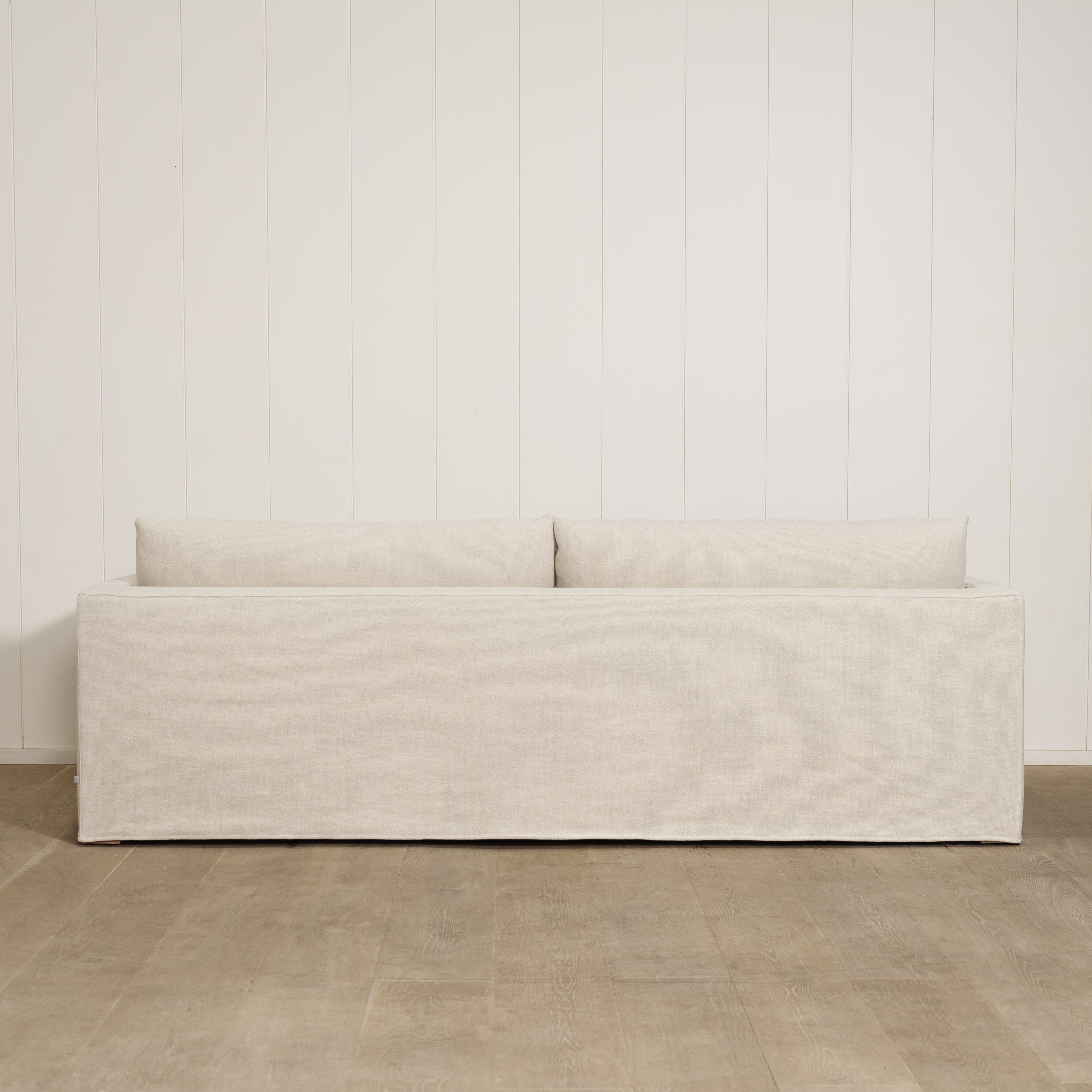 As Shown: Slipcovered in Frame Natural with a 2 over 2 Cushion Configuration