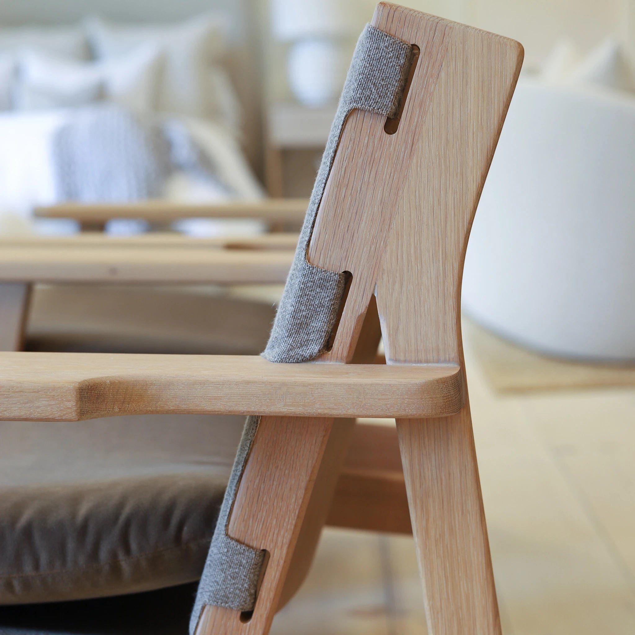 As Shown: in COM and Sky Taupe cushion.Oak finished in Mint White Natural.