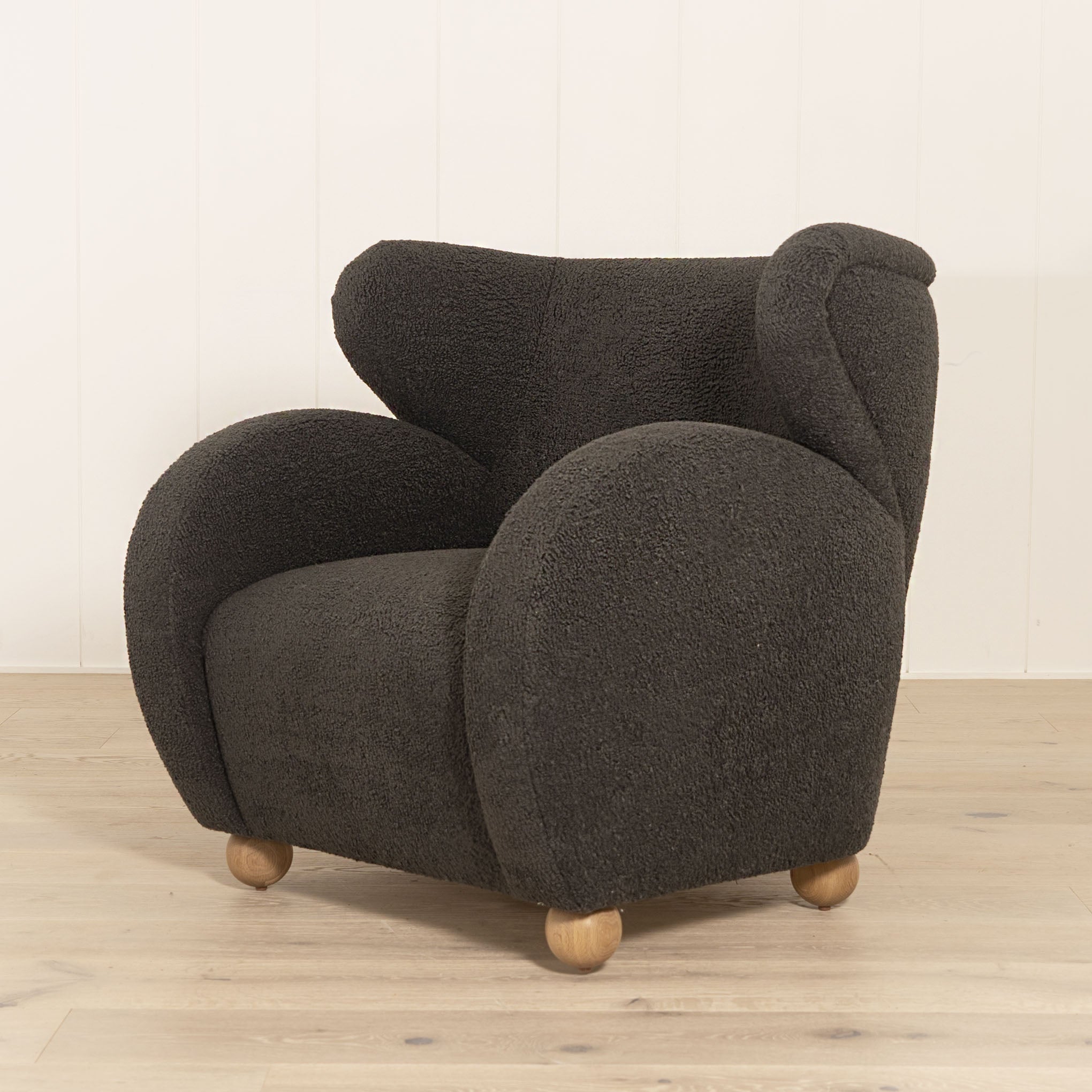 Optic Chair, Muskoka Living Collection - Shown in Sheepskin Charcoal. Oak finished in Natural.