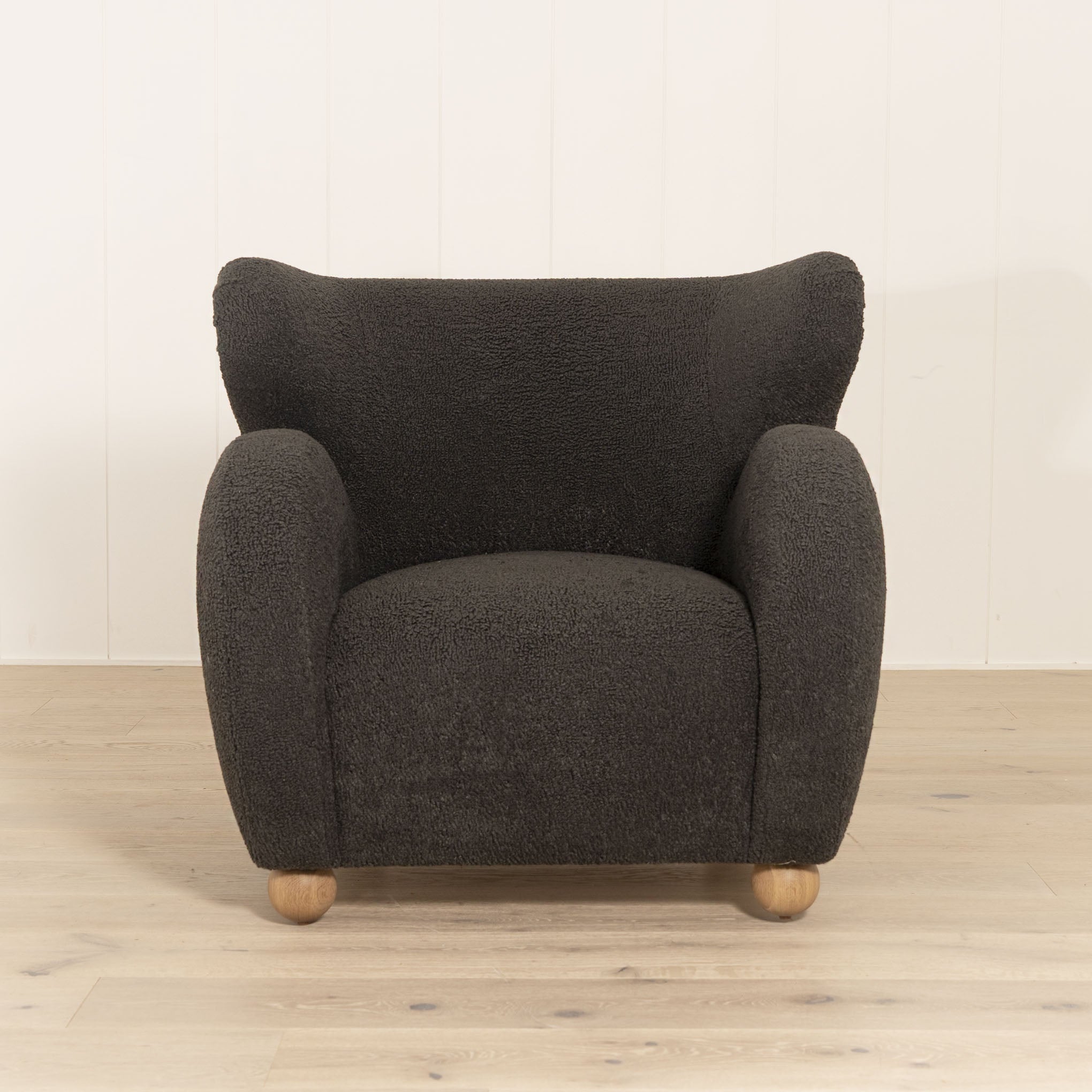 Optic Chair, Muskoka Living Collection - Shown in Sheepskin Charcoal. Oak finished in Natural.
