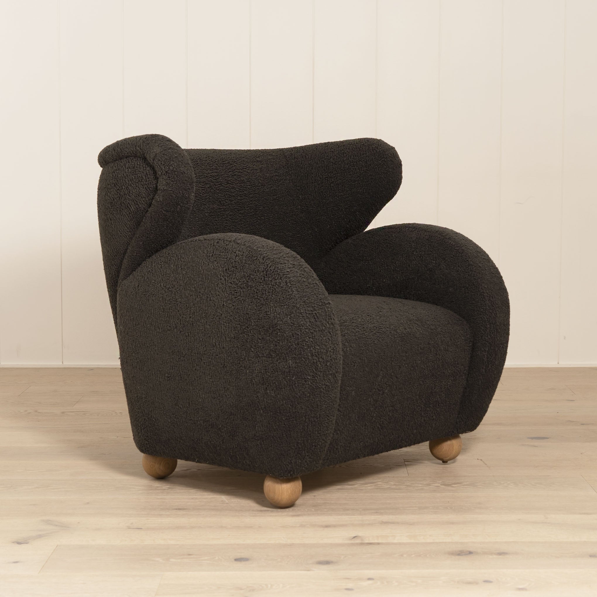 Optic Chair, Muskoka Living Collection - Shown in Sheepskin Charcoal. Oak finished in Natural.