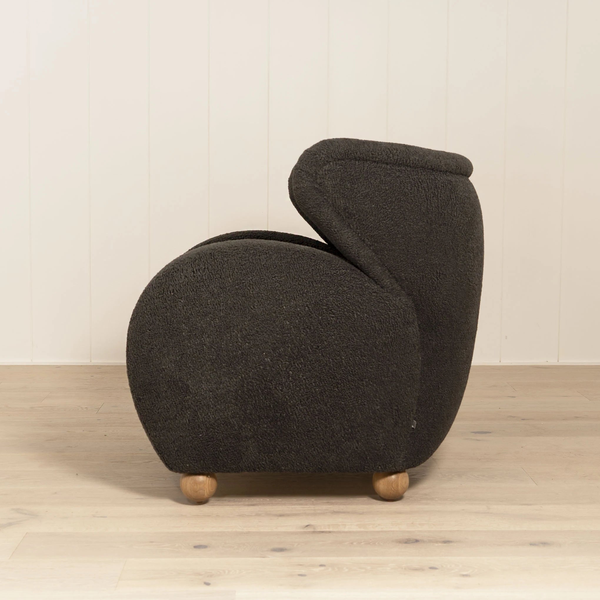 Optic Chair, Muskoka Living Collection - Shown in Sheepskin Charcoal. Oak finished in Natural.