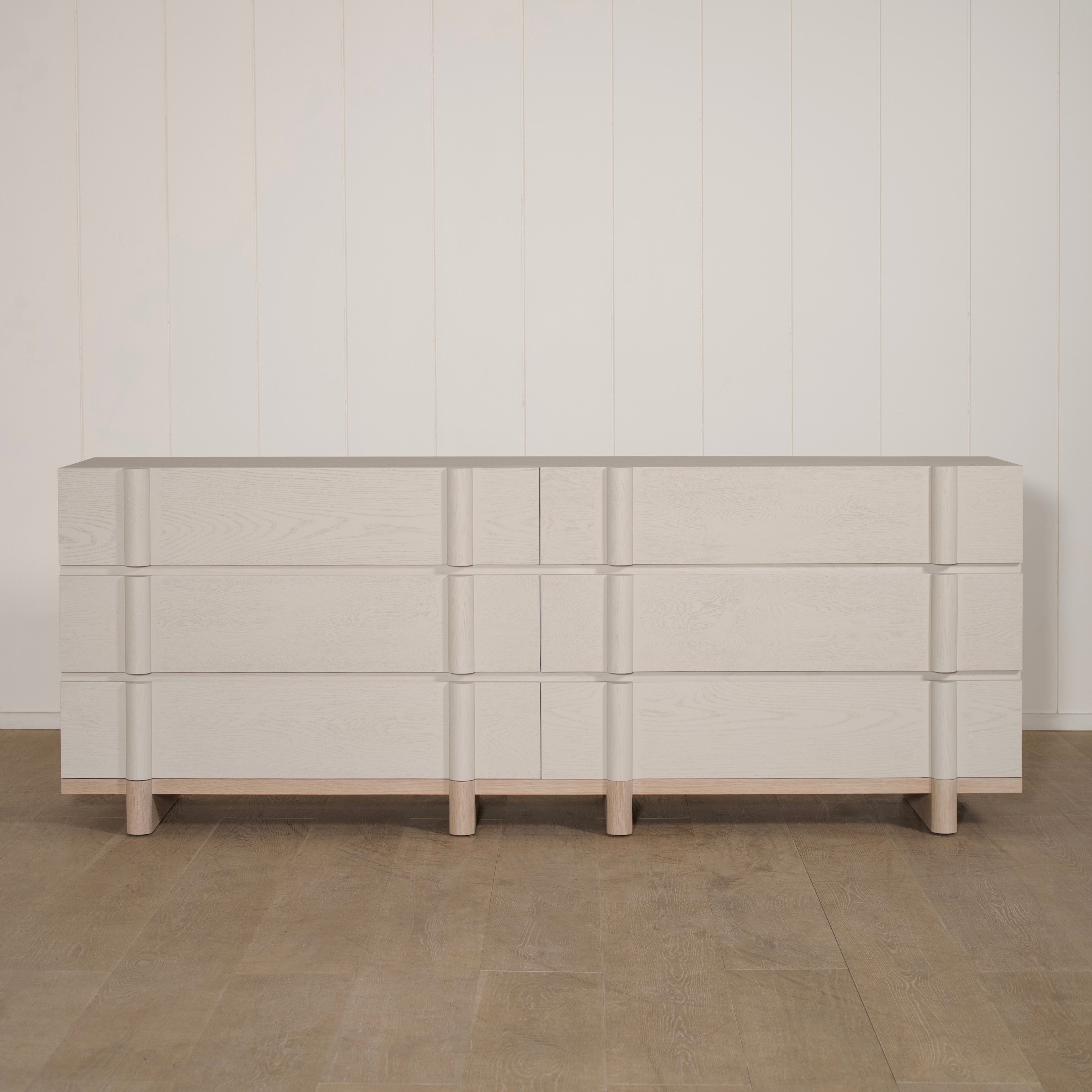 As Shown: Variant 1: (Body) Ash wire brushed in Revere Pewter, (Base) Oak stained in Sand