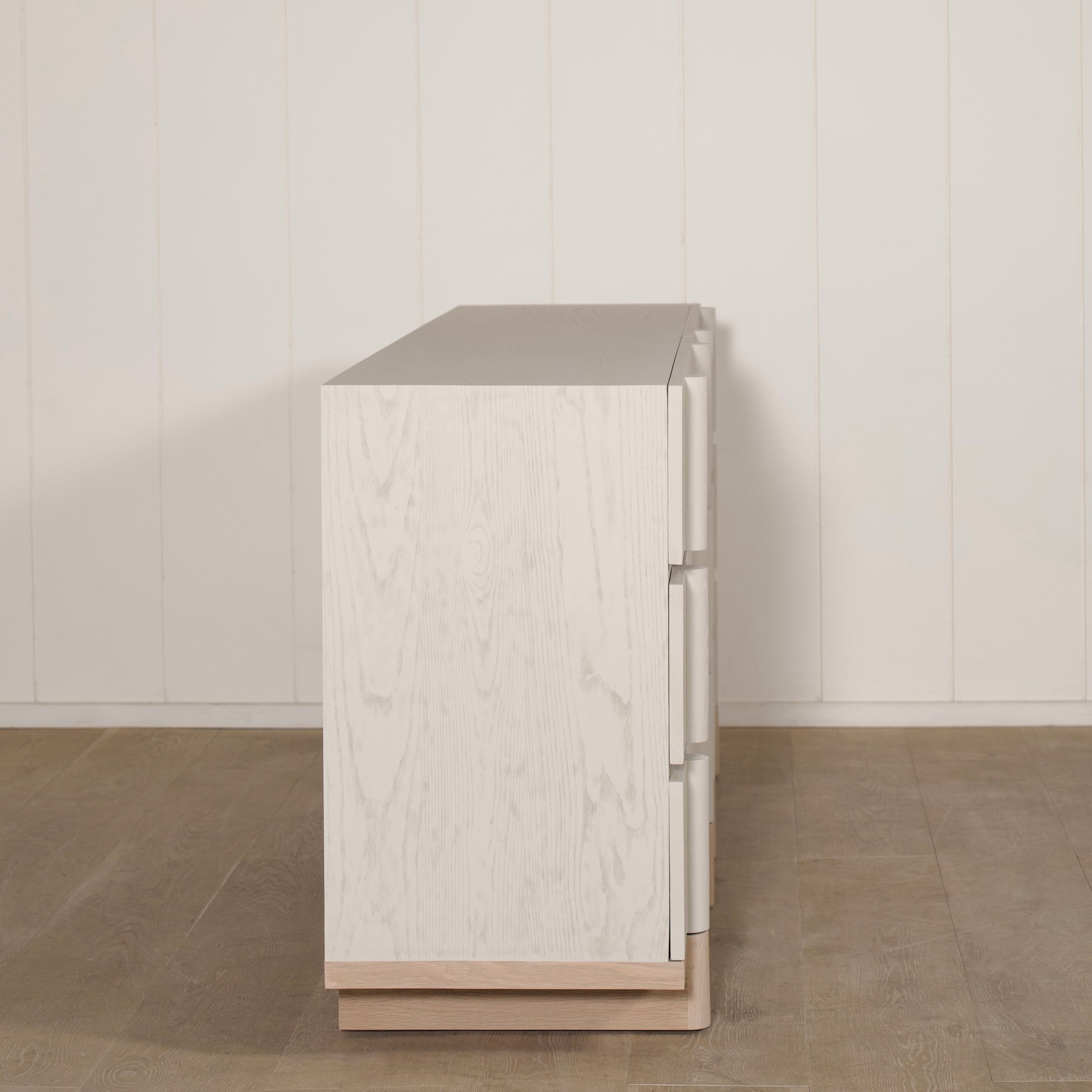 As Shown: Variant 1: (Body) Ash wire brushed in Revere Pewter, (Base) Oak stained in Sand