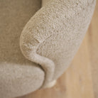 As Shown in Berber Shale, legs finished in Sand.